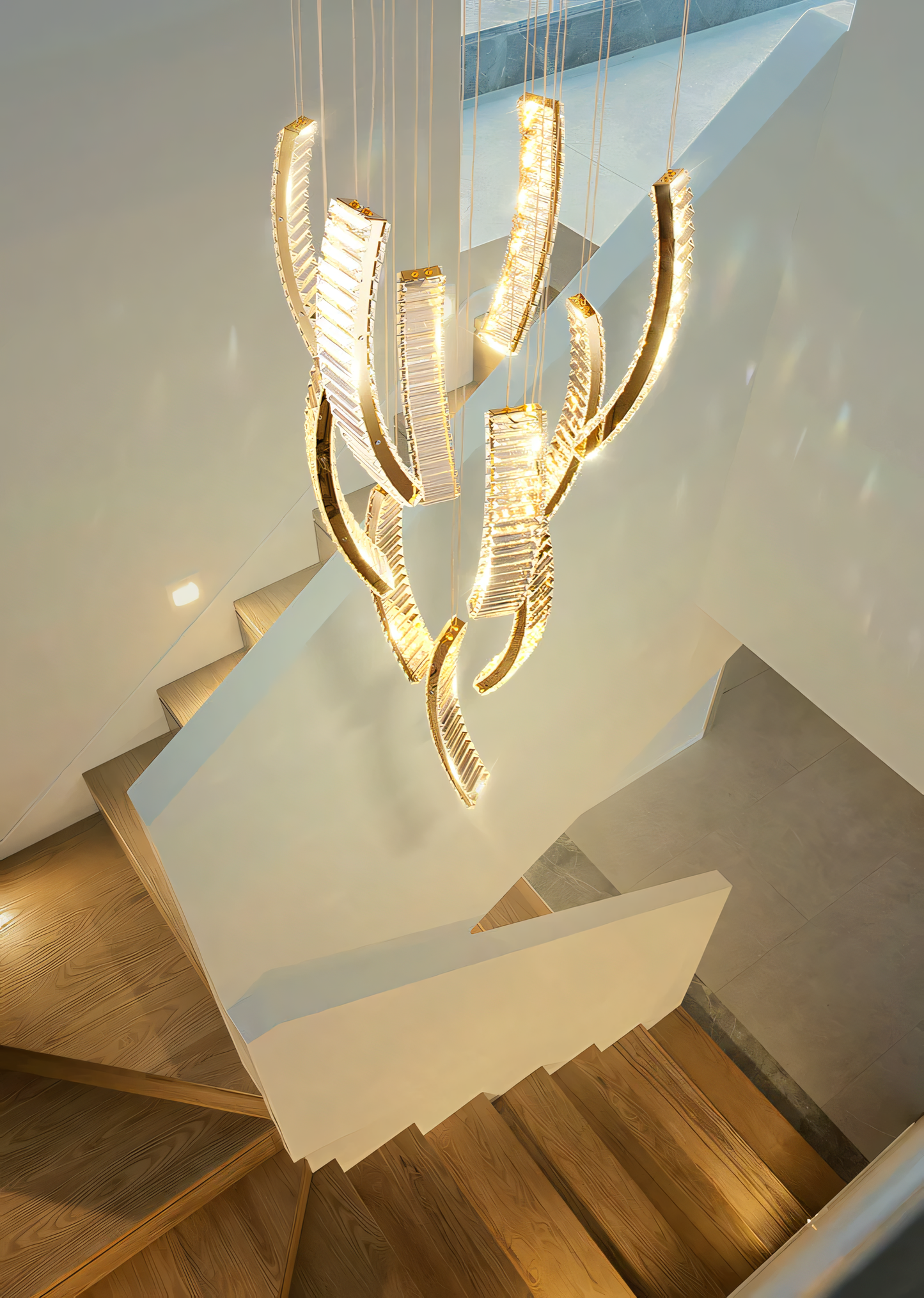 Captivating double-height chandelier for a coastal living space