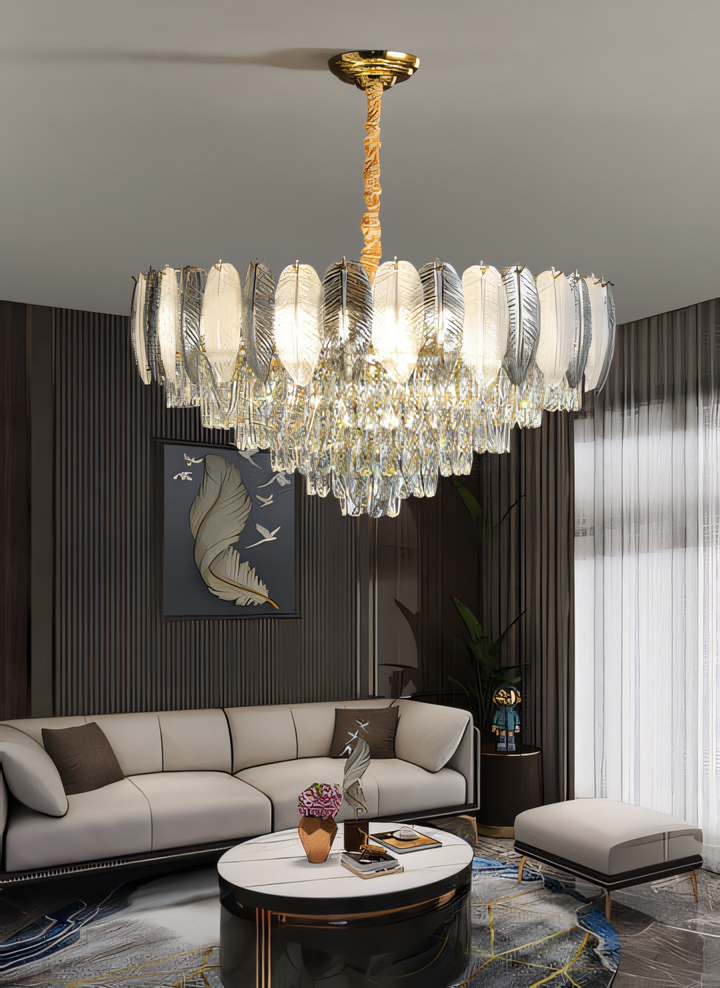 Modern meets fairytale! This 600mm Gold Feather Glass Chandelier features a unique design with cascading crystal feathers, perfect for a touch of whimsical elegance.