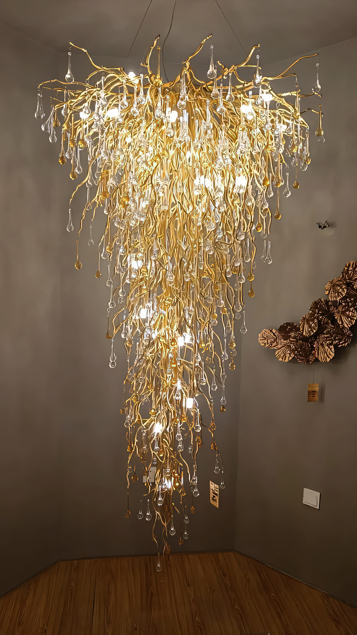 Warm, ambient G9 bulb lighting in celestial-inspired chandelier