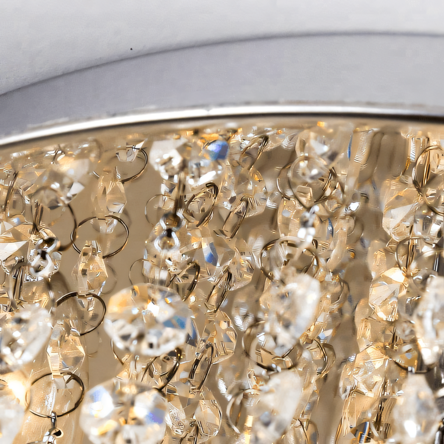 Dazzling array of crystal panels in flush mount ceiling fixture