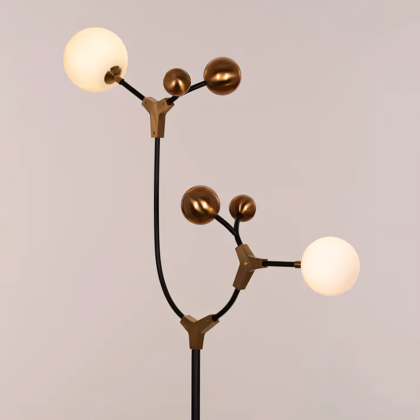 Owe & Awe Floor Lamp with a matte black metal body and frosted glass shades