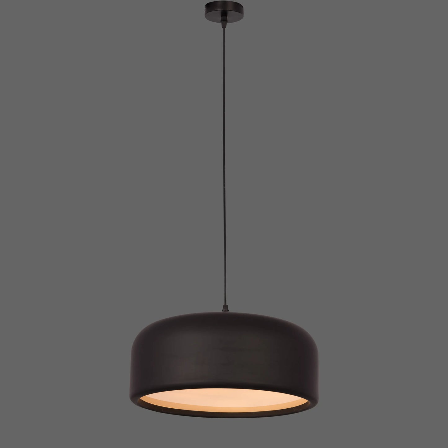 An artistic pendant light with a sleek, abstract design. It features a brushed brass metal frame, suspended by thin cables, with soft, warm light emitted through frosted glass diffusers. The light creates a modern, elegant ambiance, perfect for contemporary interiors.