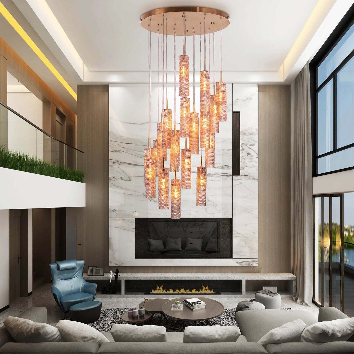Large gold chandelier with cascading champagne glasses, resembling falling snow