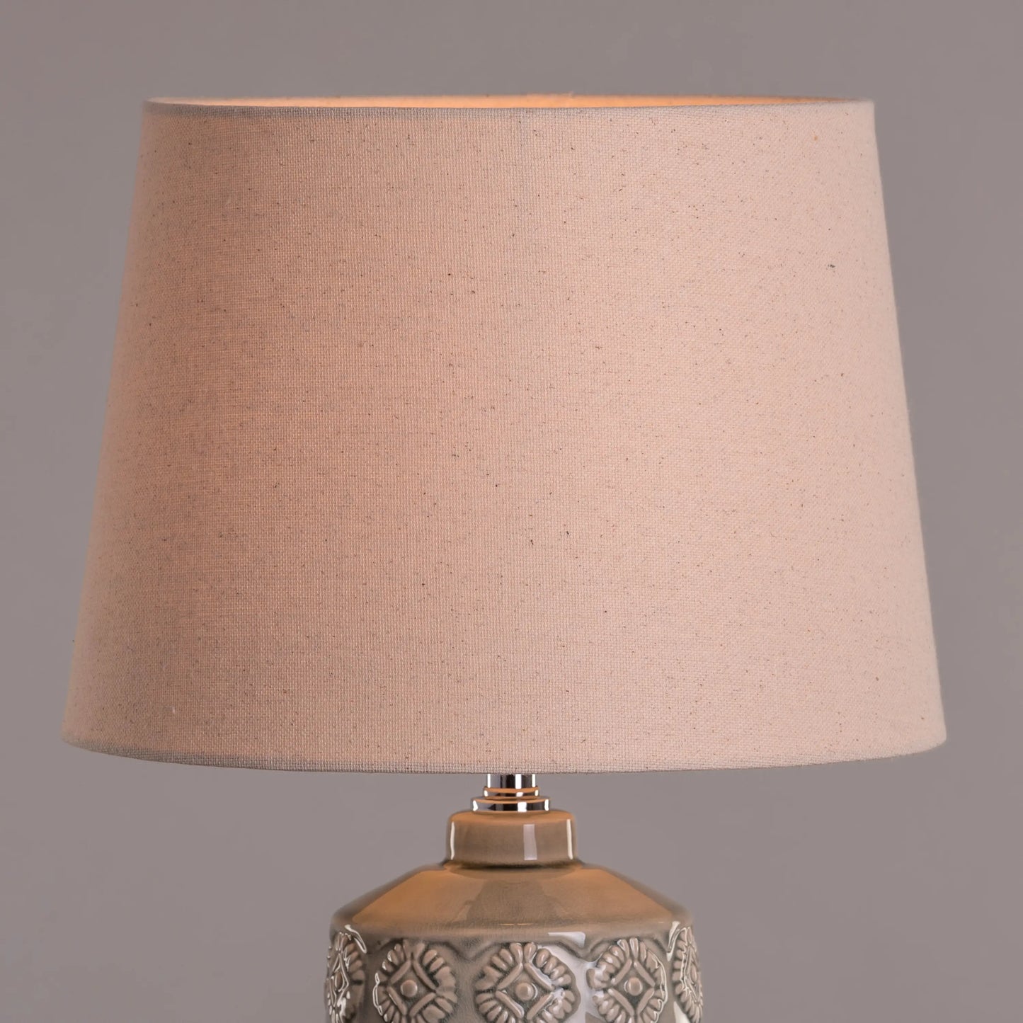 Luxurious cream-colored ceramic base table lamp