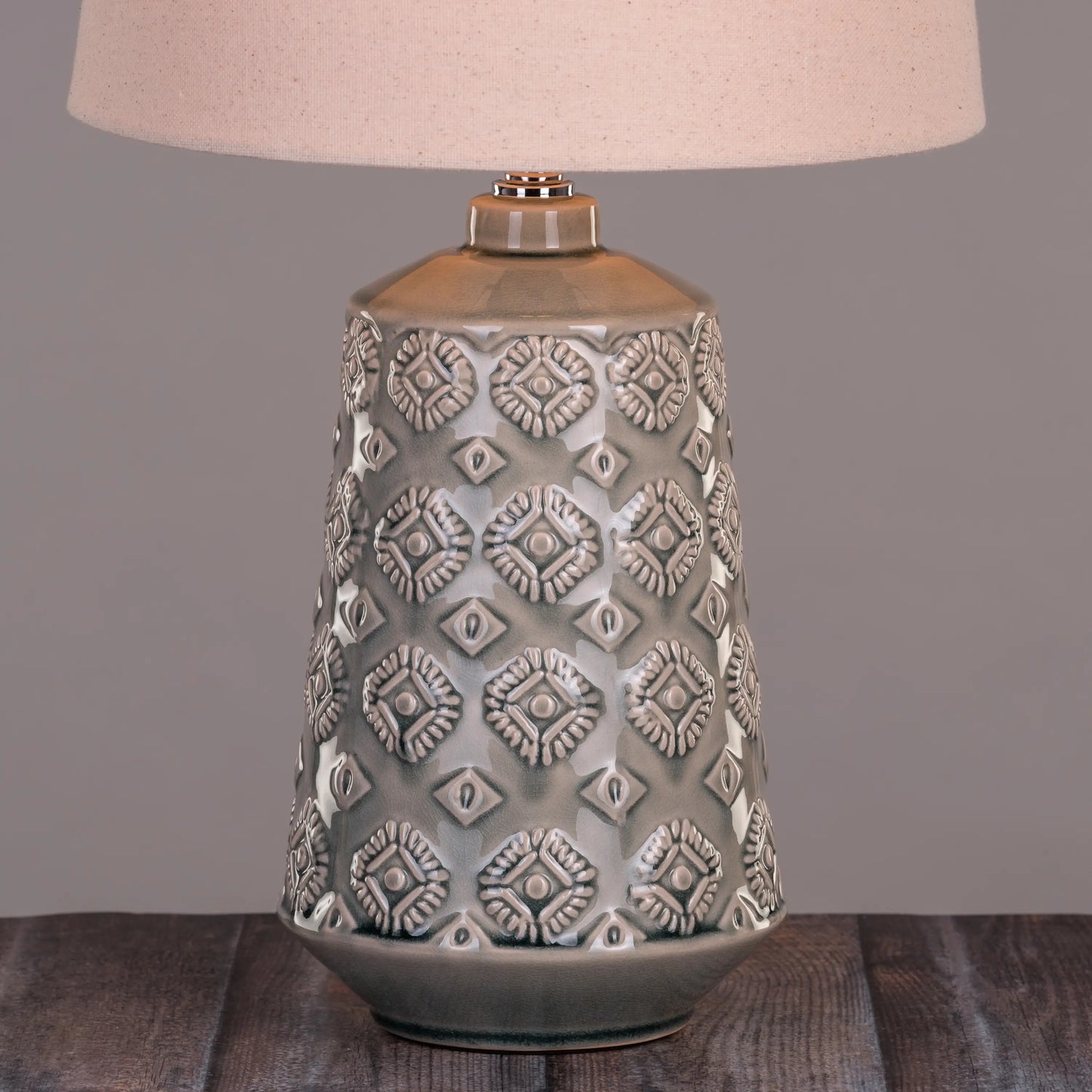 Warm and inviting ambiance from cream ceramic lamp