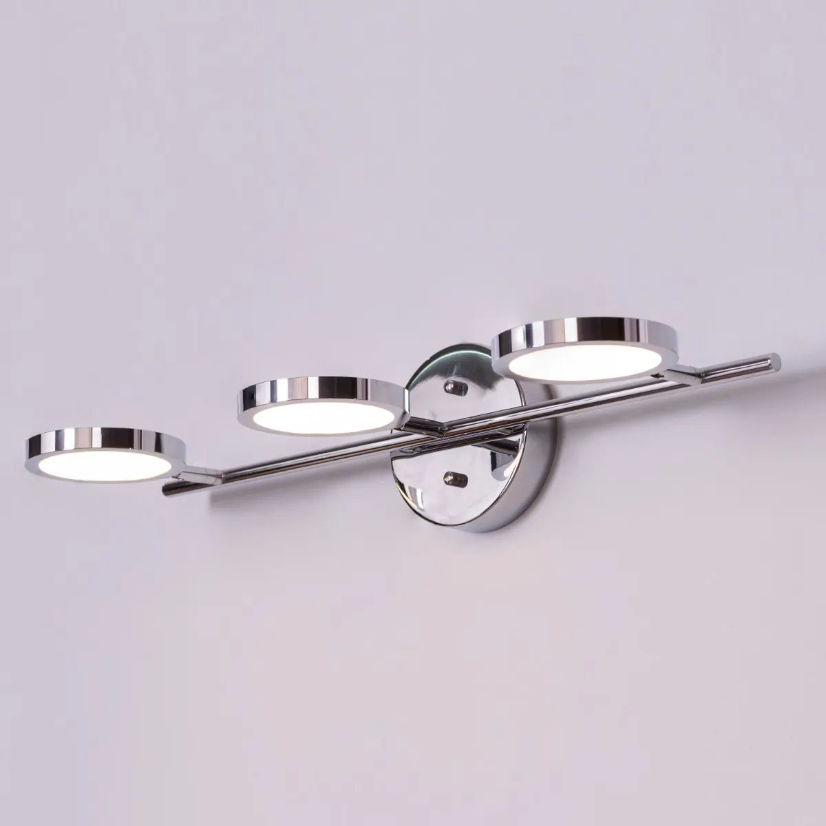 Roundabout Vanity Light – Sleek, minimalist circular fixture with energy-efficient lighting, perfect for bathroom and vanity spaces.
