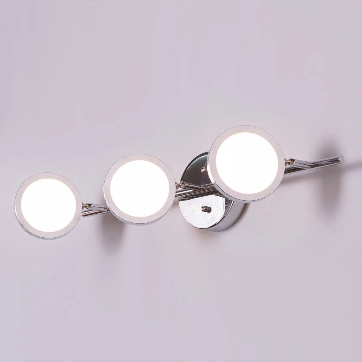 Roundabout Vanity Light – Sleek, minimalist circular fixture with energy-efficient lighting, perfect for bathroom and vanity spaces.
