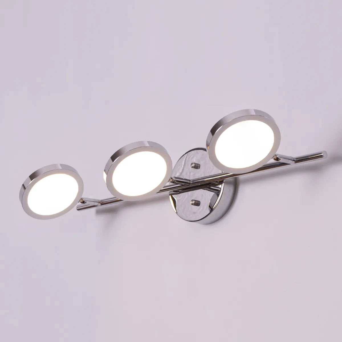 Roundabout Vanity Light – Sleek, minimalist circular fixture with energy-efficient lighting, perfect for bathroom and vanity spaces.