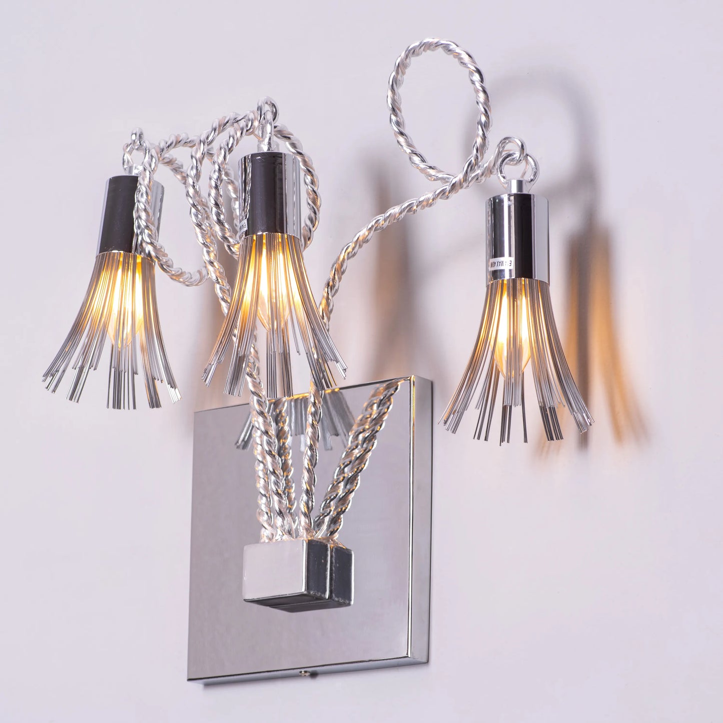 Wild Honey Wall Light – rustic and elegant wall light with textured finish, offering warm, inviting illumination that adds charm and sophistication to any space.