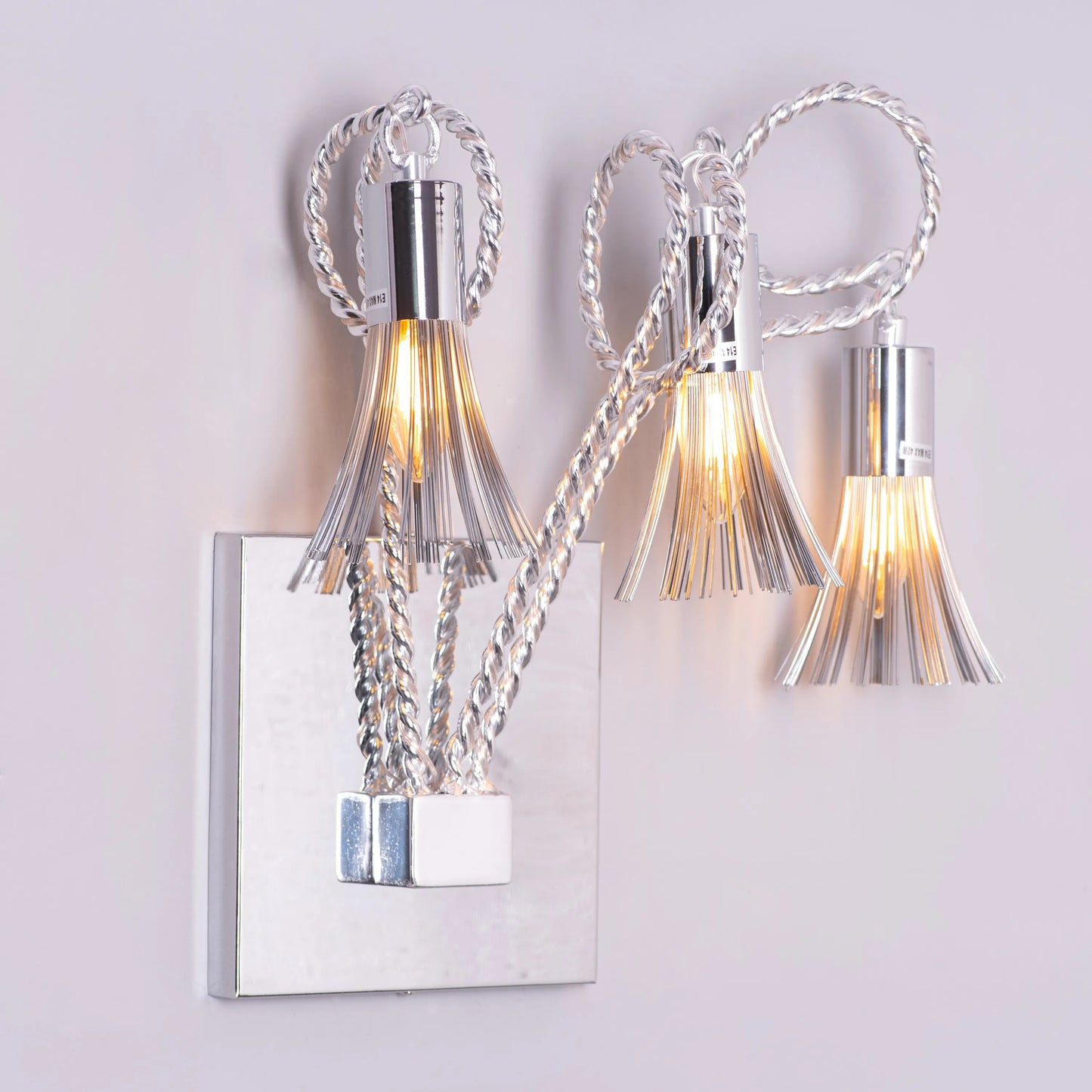 Wild Honey Wall Light – rustic and elegant wall light with textured finish, offering warm, inviting illumination that adds charm and sophistication to any space.