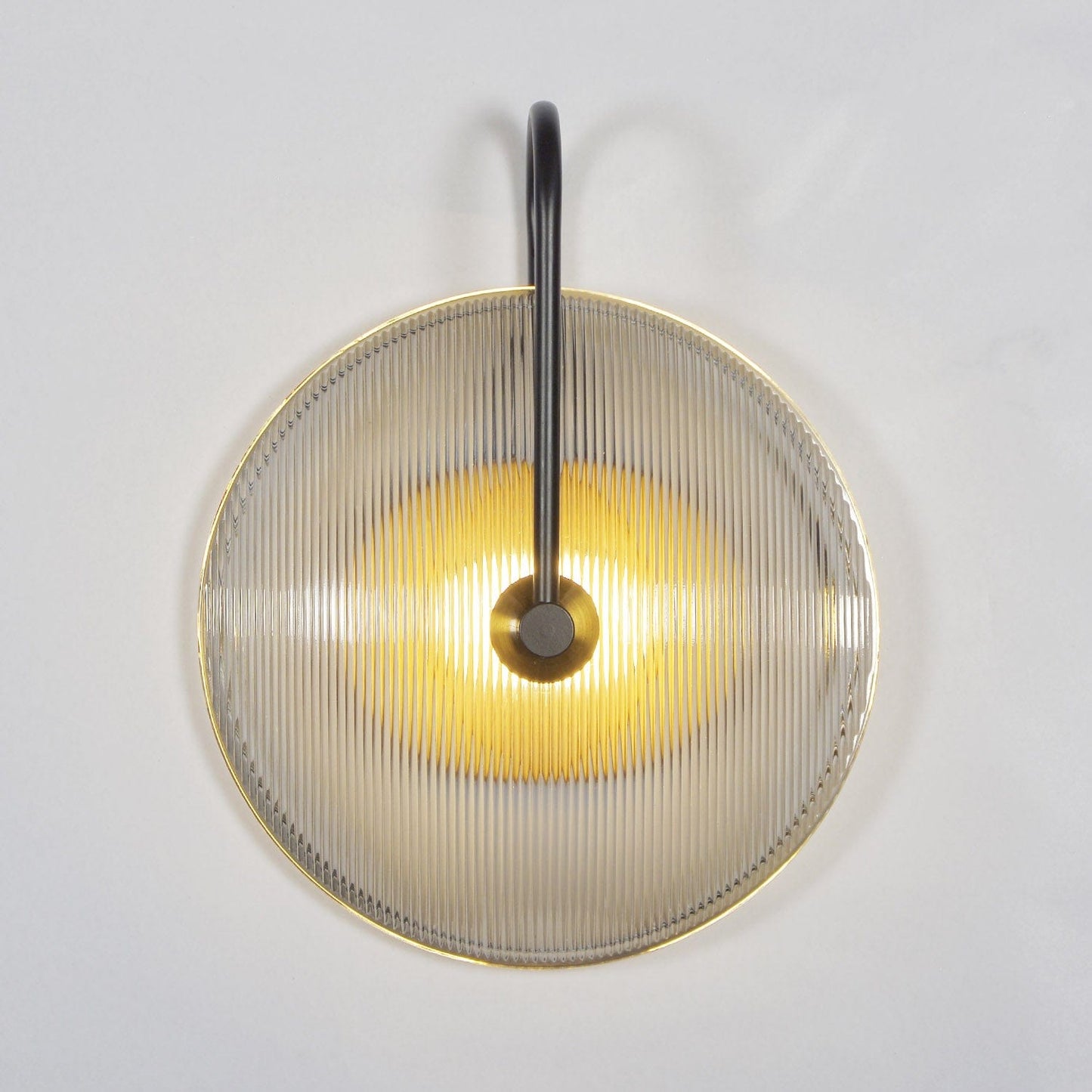Light's Transformative Dance, Captured in Metal and Glass