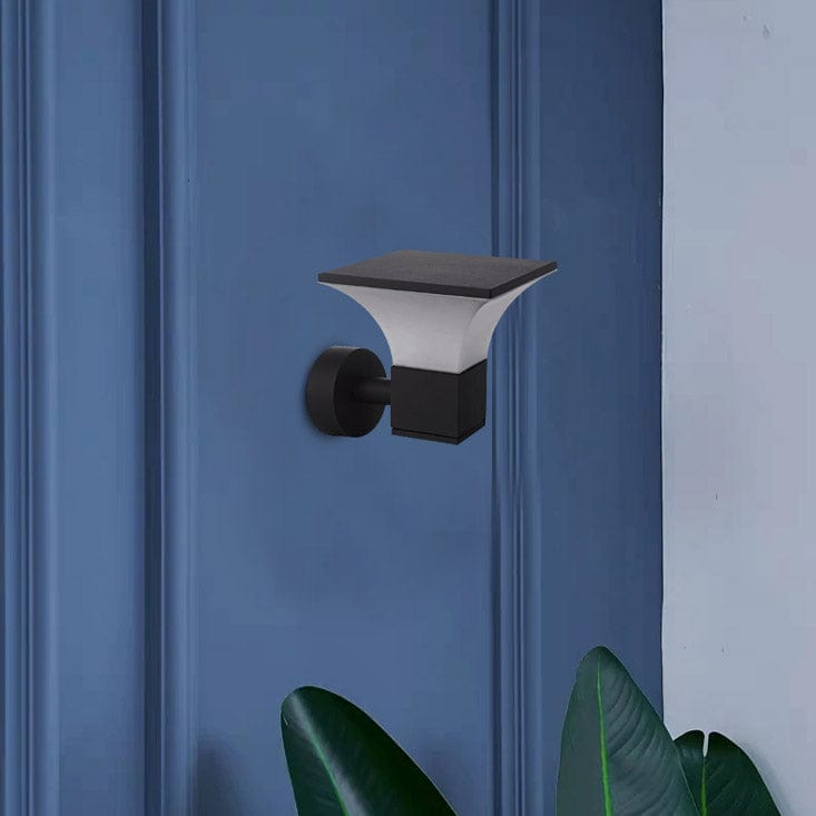 Ancient square wall sconces illuminating a forgotten city