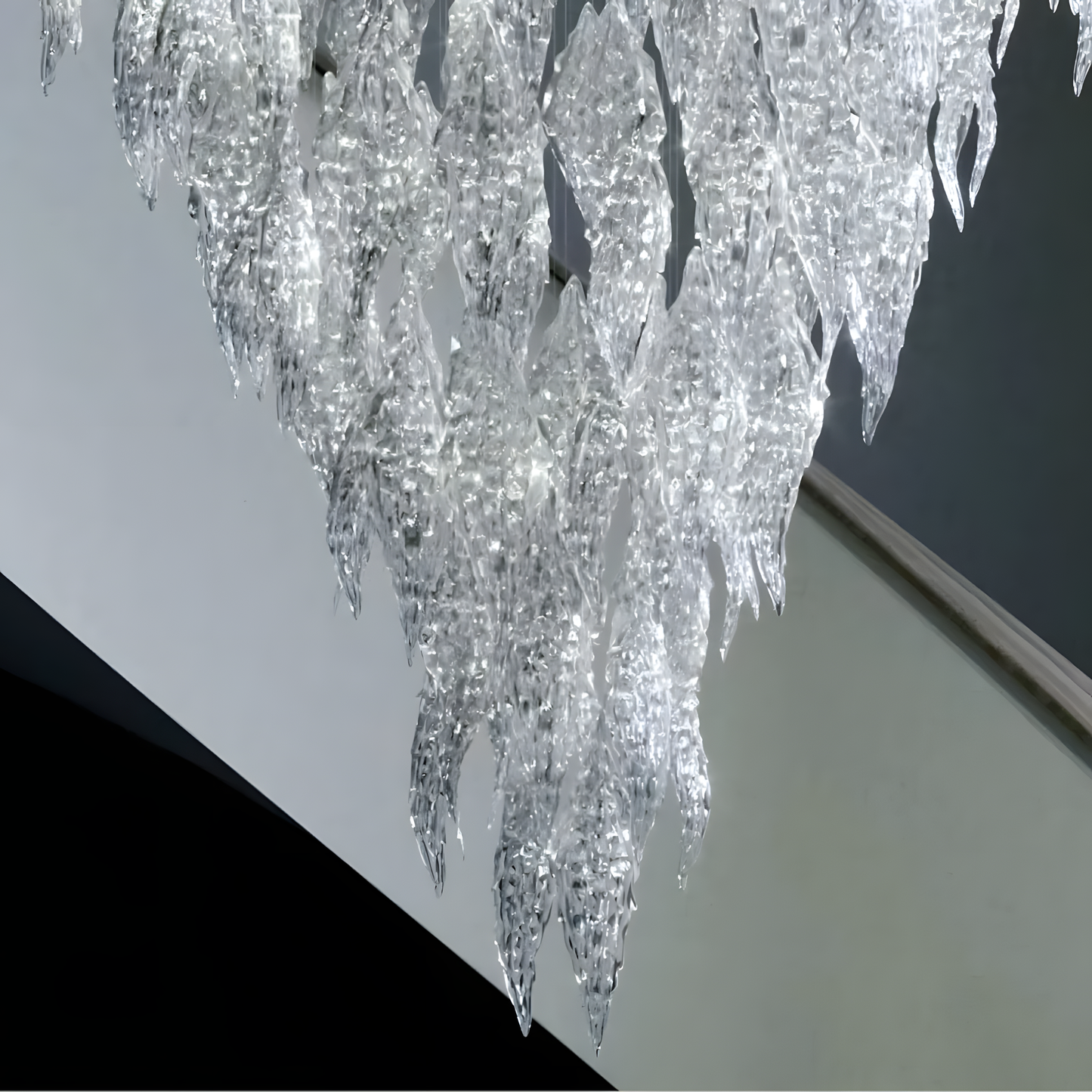 Intricate, multi-tiered design of the Icy Frosted Leaves Glass Chandelier