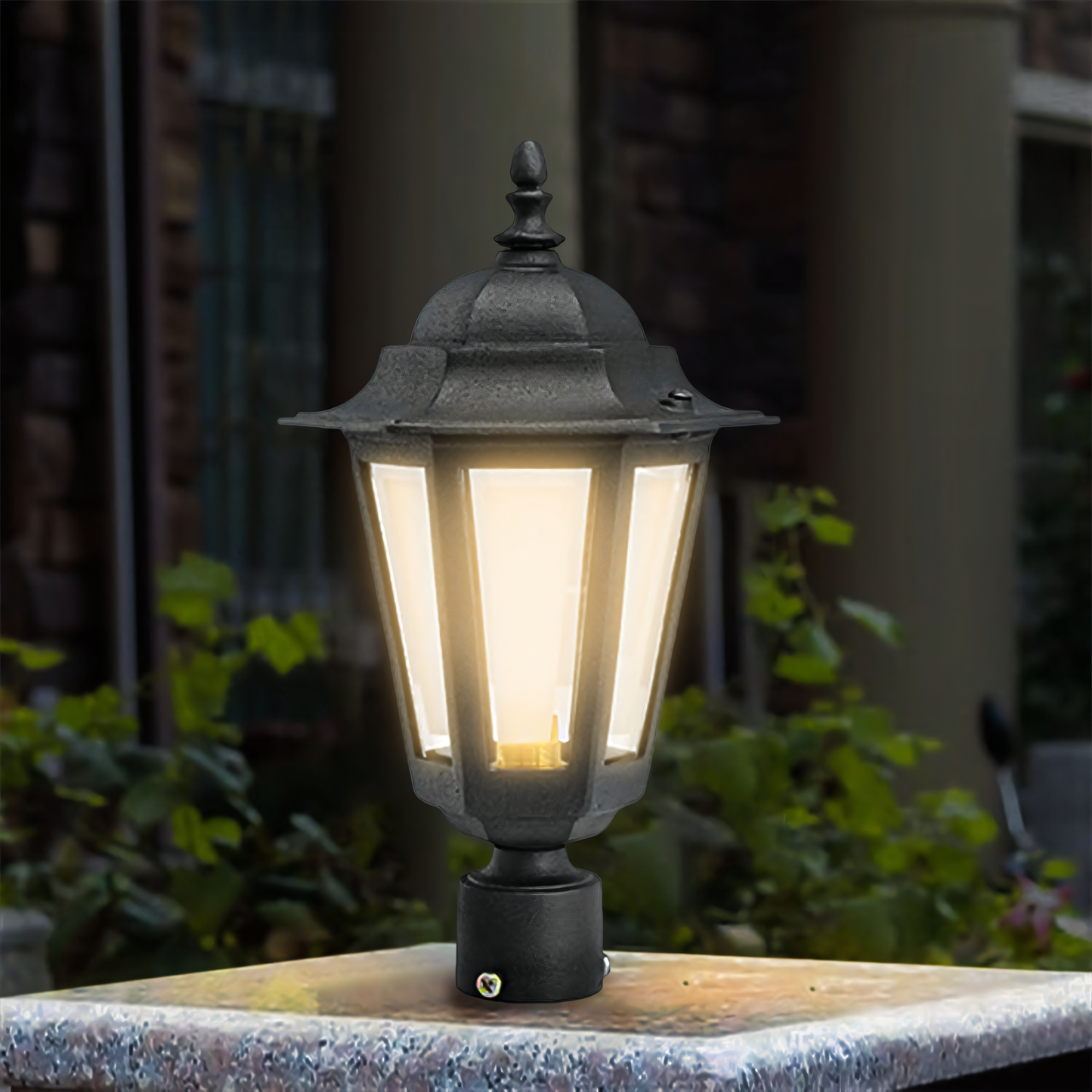 Warm LED illumination of the Alps Gate Light against a backdrop of snow-capped peaks