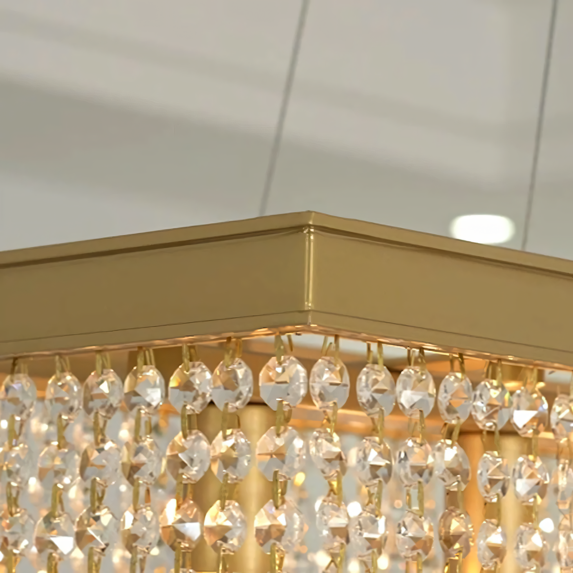 Meticulously arranged 30mm crystal panels in dining room chandelier