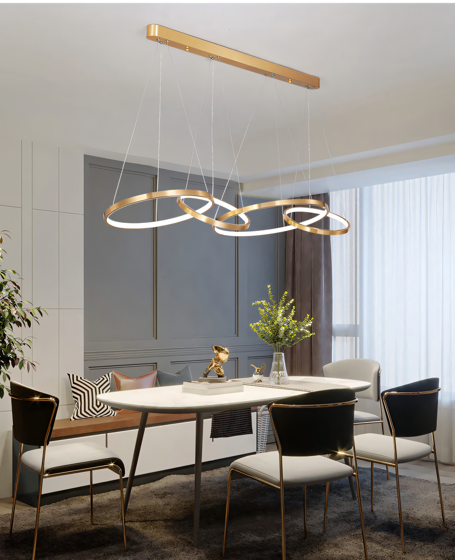 4-ring gold chandelier with a sleek metal body, perfect for adding a touch of elegance to living rooms, dining rooms, and offices.