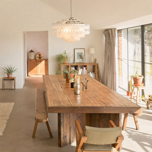 Stunning crystal and acrylic modern LED chandelier in a serene forest setting