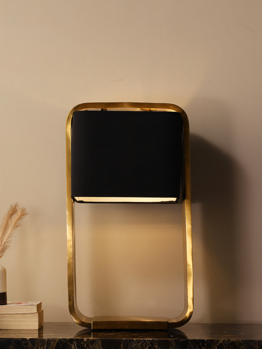 Dark and golden table lamp with regal allure