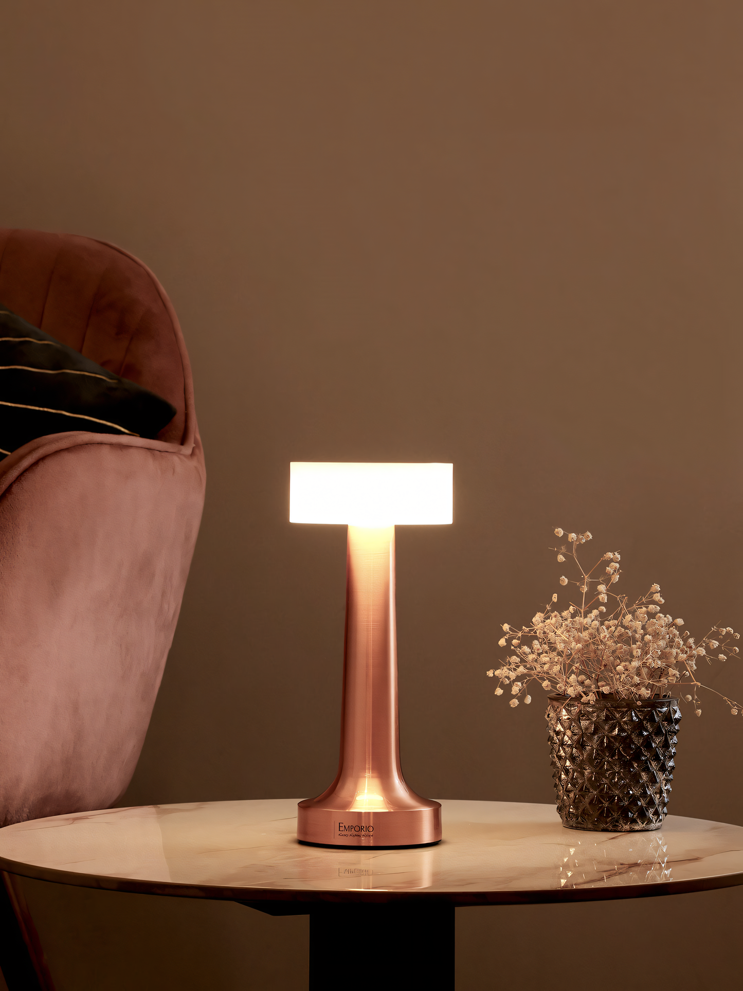 Sleek and modern rose gold and white table lamp