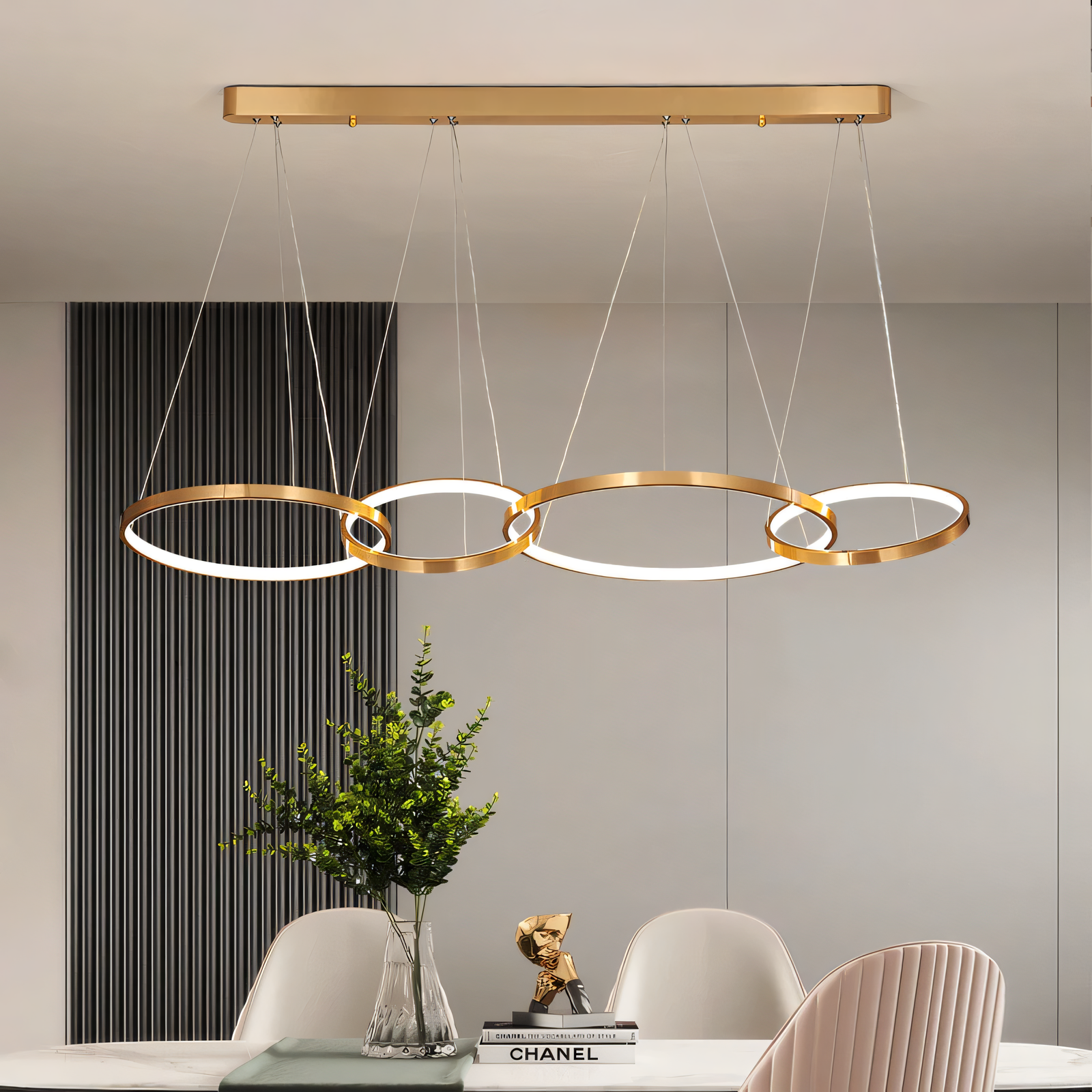 Unique alternative to traditional chandeliers, this 4-ring gold LED chandelier offers a modern and captivating look.