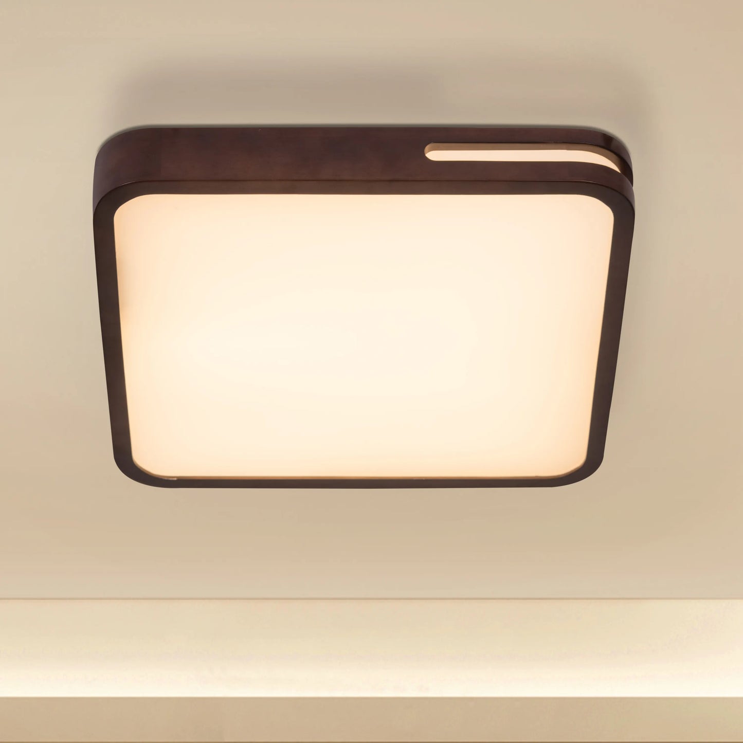 Remote-controlled wooden LED ceiling light.