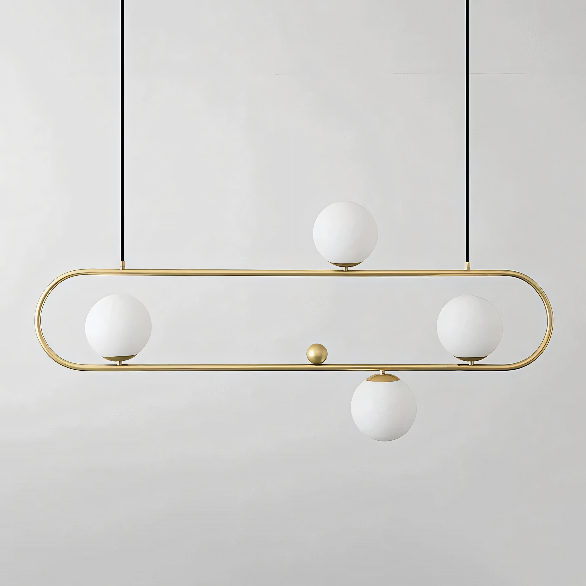 Warm, gold-finished metal body of the Orionis Chandelier