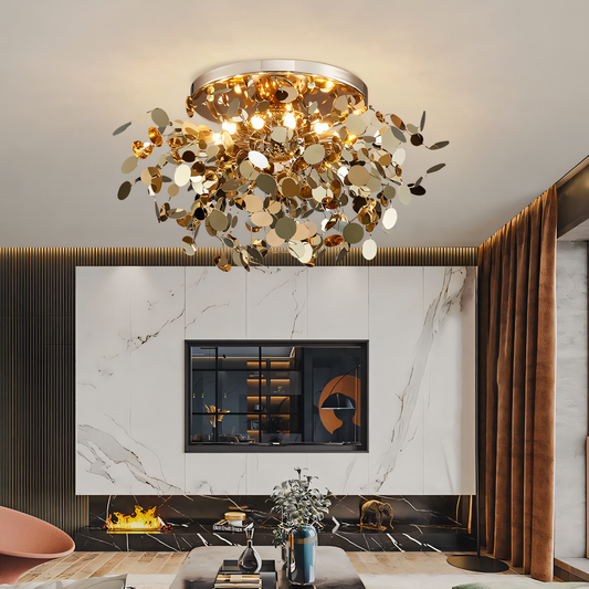 Opulent gold and metal 750mm modern chandelier with cascading leaf-inspired accents hanging in a grand, high-ceilinged lobby