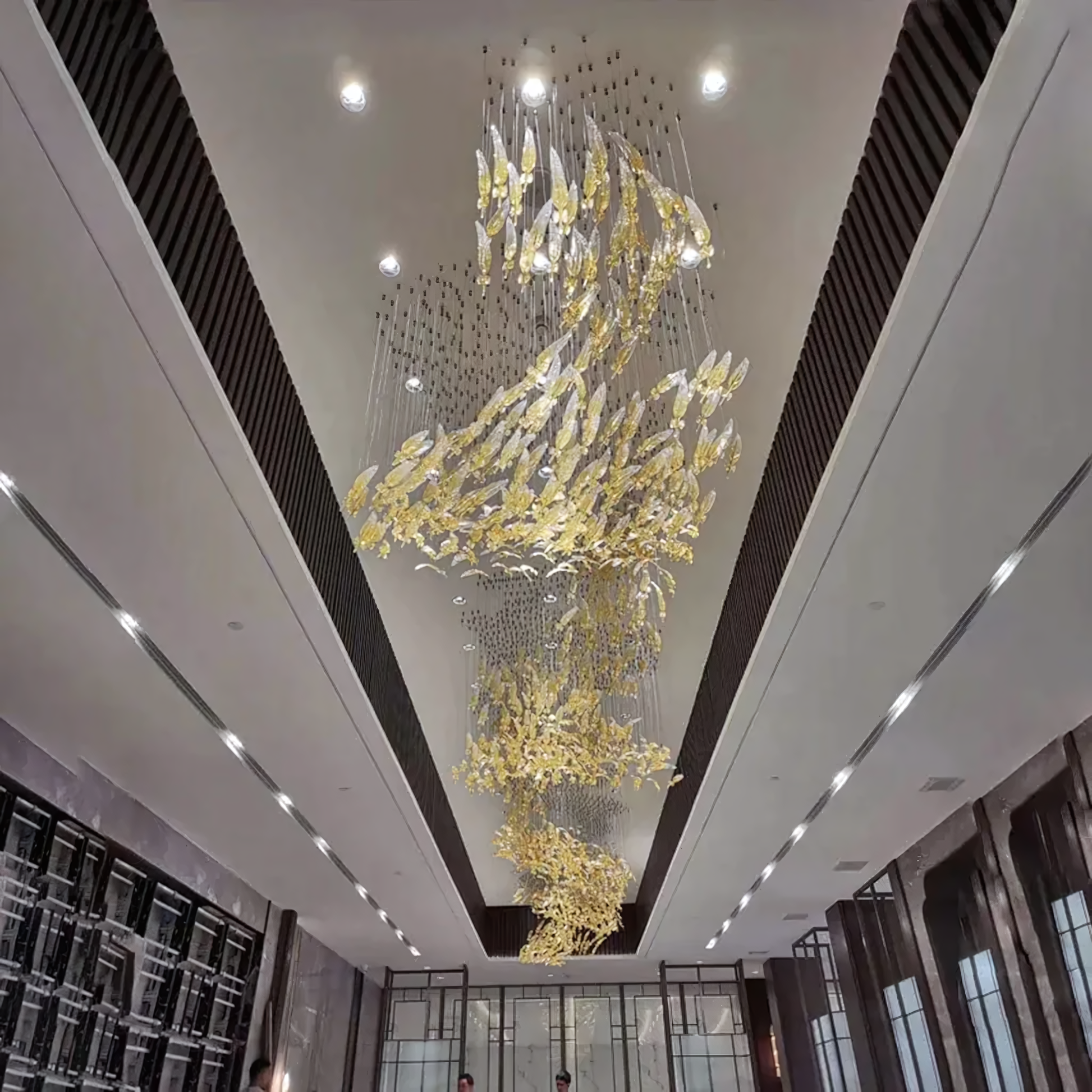 Warm, ambient glow of the Folium Leaves Modern Chandelier