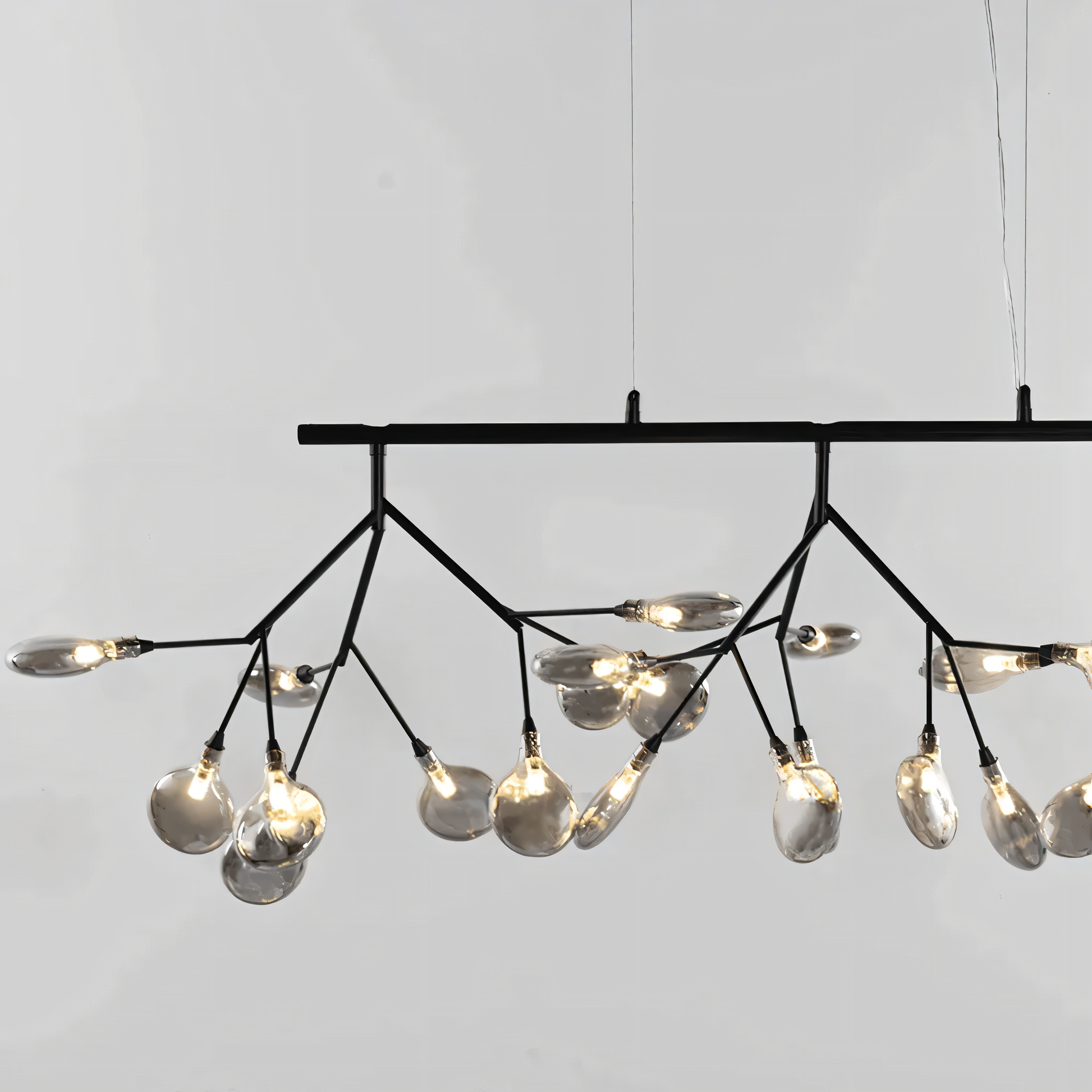 The adjustable hanging length of the Blaze Modern Dining Chandelier makes it perfect for various ceiling heights.