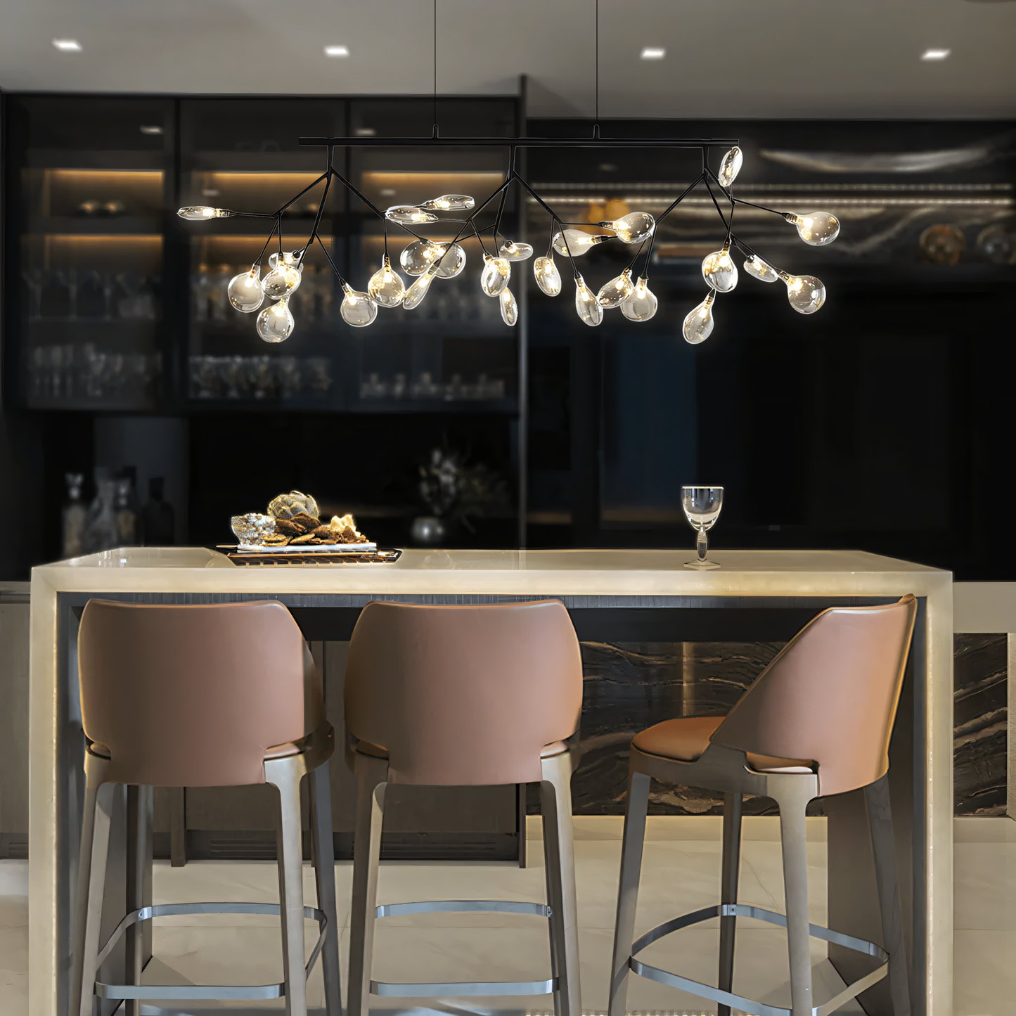 The Blaze Modern Dining Chandelier adds a touch of rustic charm to a minimalist dining room. The chandelier's warm light fills the room.