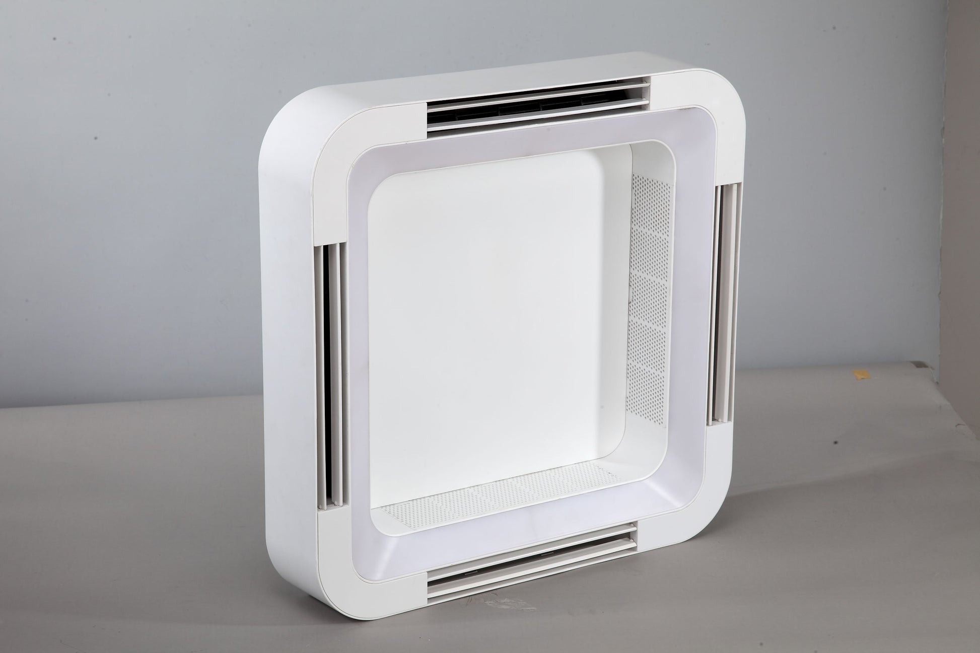 Square white QuadFlow Zen Air with rounded corners and multi-directional intakes