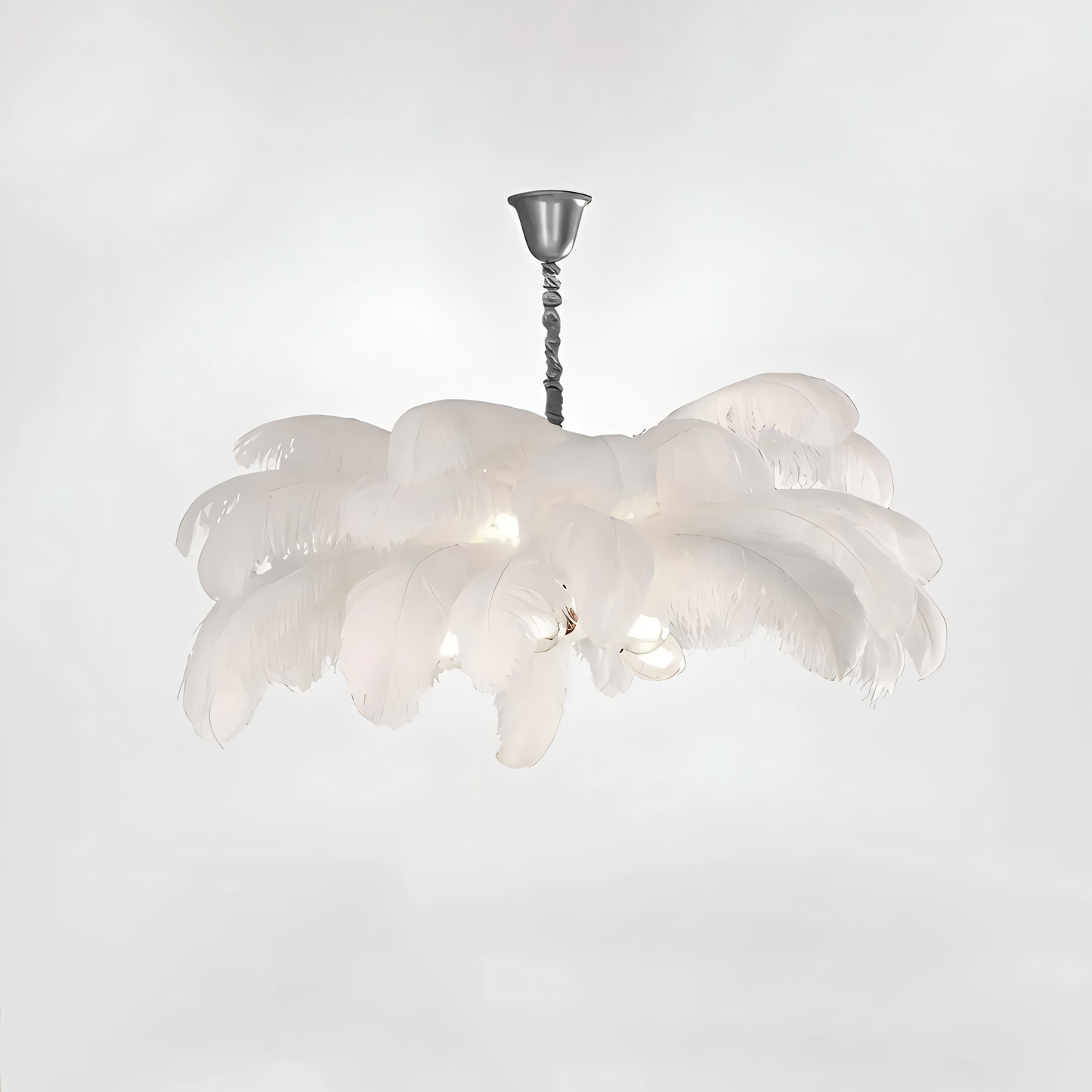 The Ostrich Plume Chandelier casts a soft, ethereal glow on a modern living space.