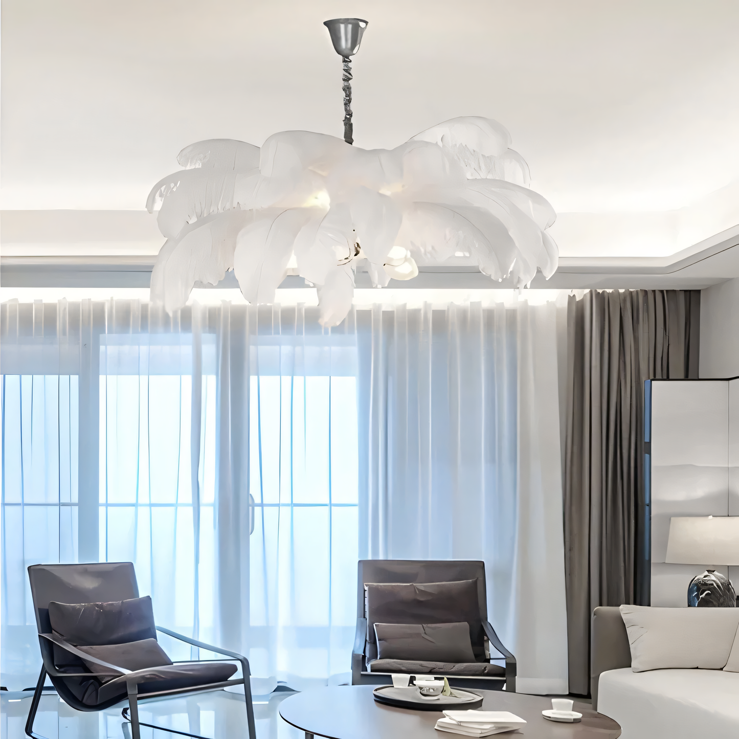 The white and blue ostrich feathers of the chandelier resemble delicate wildflowers swaying in the breeze.