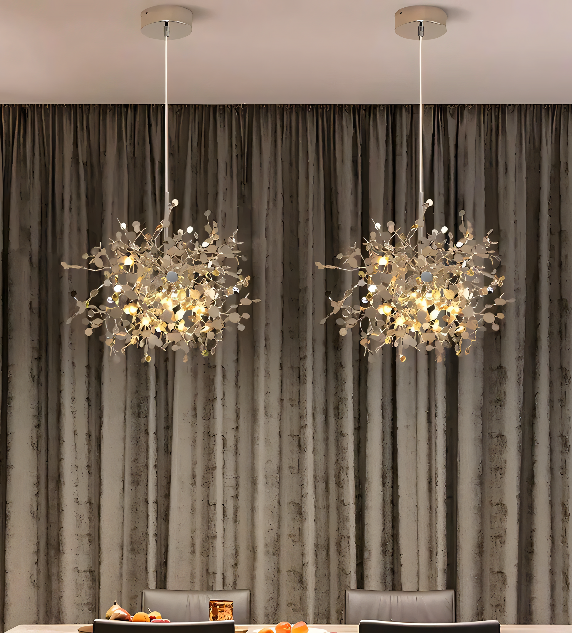 A close-up of the Astral Debris Chandelier reveals the intricate details of the gold frame and the cascading crystals.