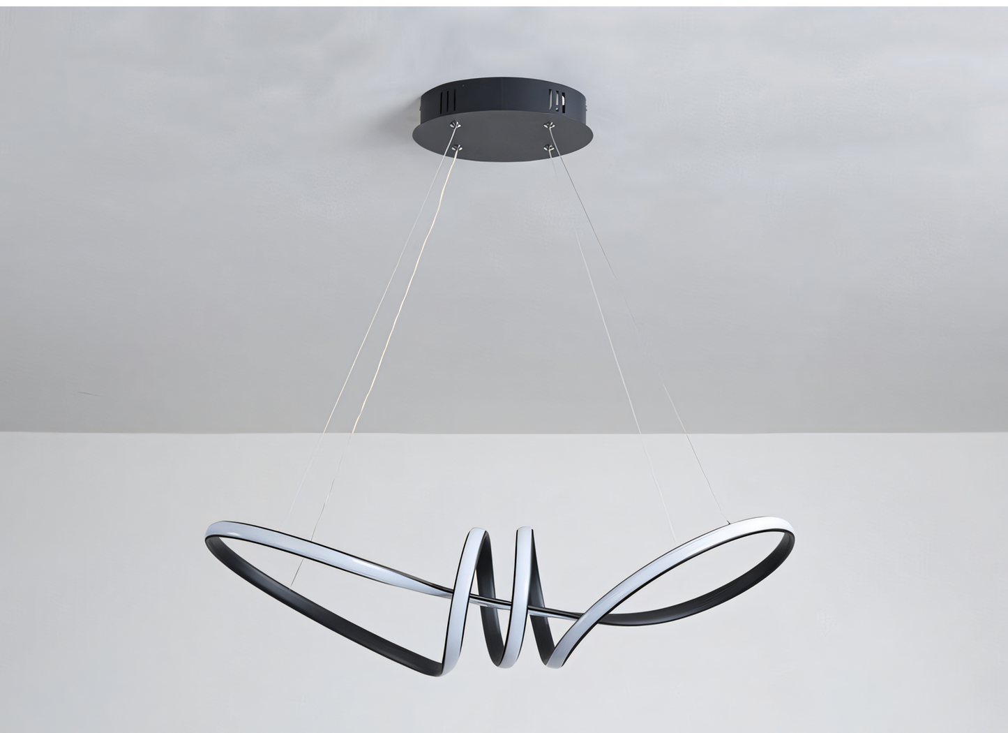 Sleek, contemporary hanging light fixture featuring a 700mm diameter black metal frame and seamless LED panels for a refined, ambient glow