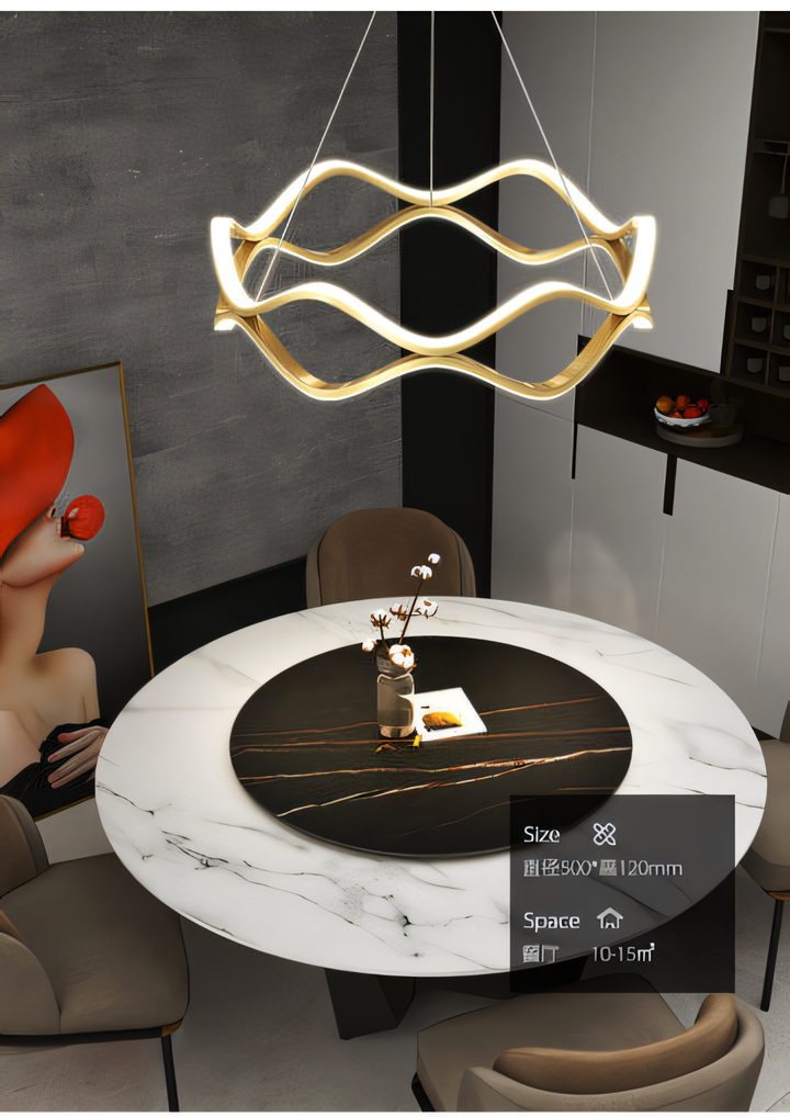Detailed shot of the 600MM Gold LED Curvy Profile Chandelier Lamp's polished, golden finish