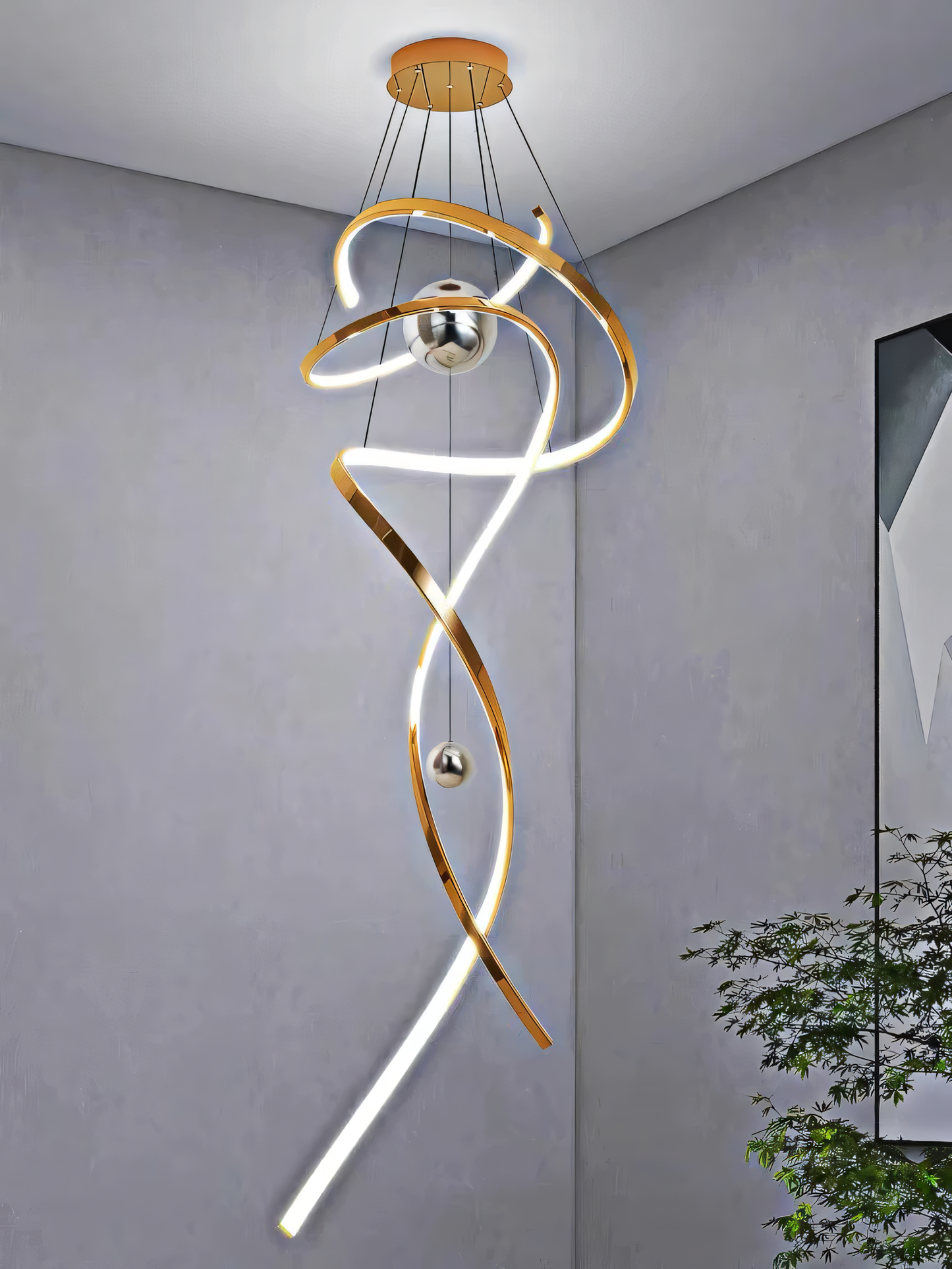 Double height staircase chandelier for urban luxury