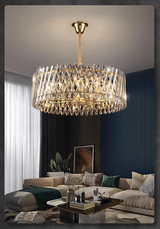 Sparkling 600mm Gold Crystal Pendant Chandelier features cascading crystals for a raindrop-like display of light. Perfect for living rooms, dining rooms, and more.