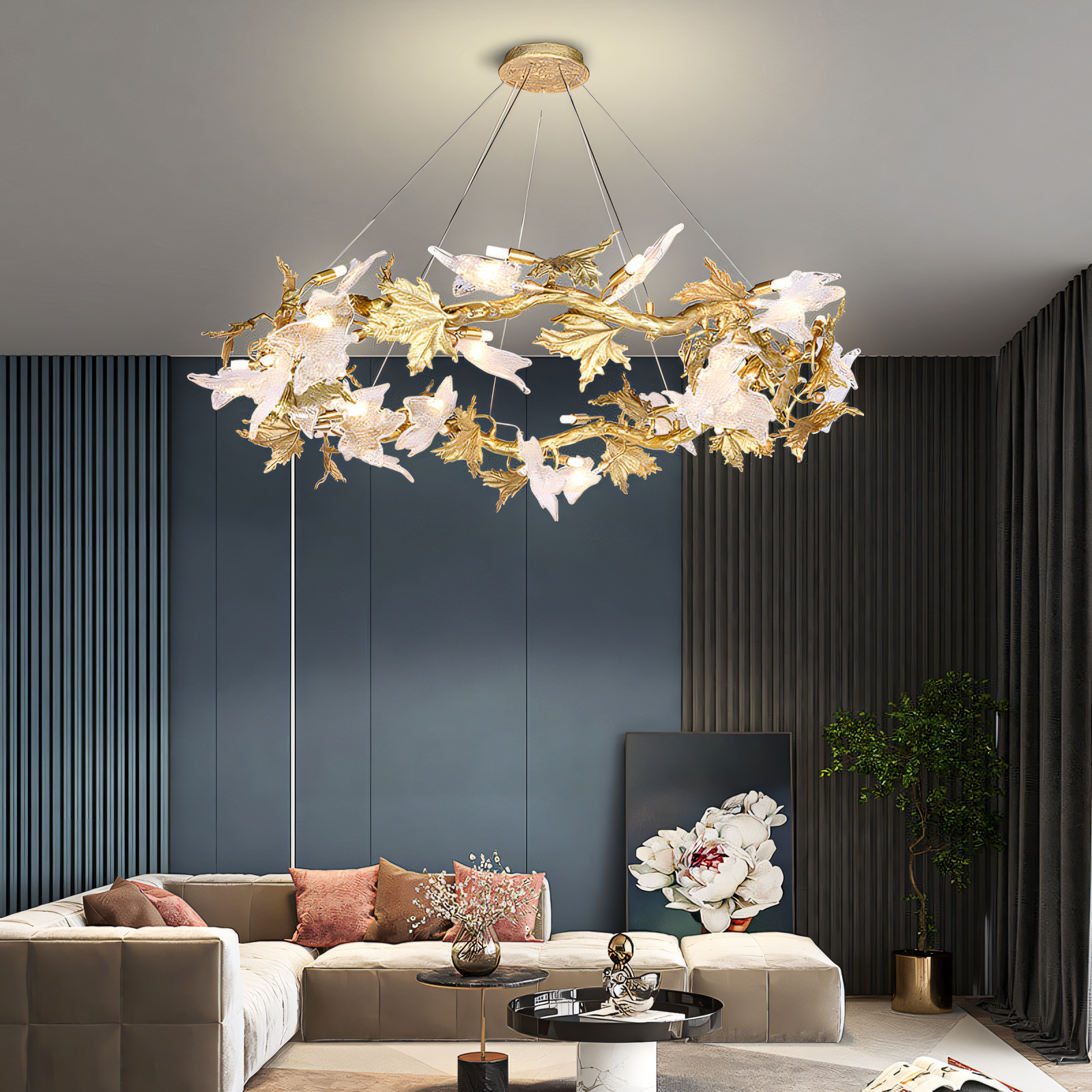 A gold chandelier with crystal teardrops and maple leaf accents hangs from a dining room ceiling. The chandelier casts a warm, inviting glow on the space.