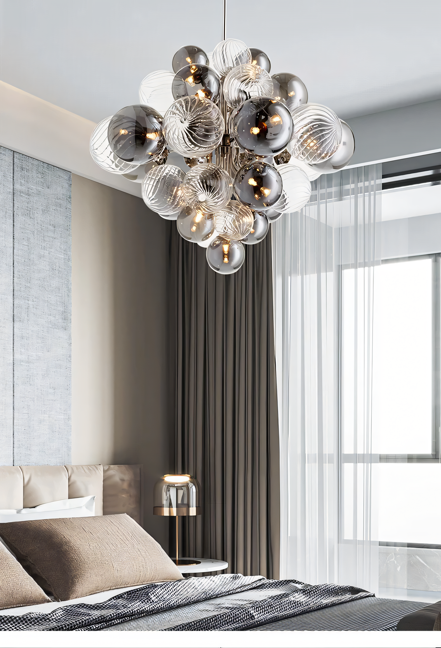 Energy-efficient LED chandelier with a unique design of smokey and clear glass globes suspended from a silver frame.