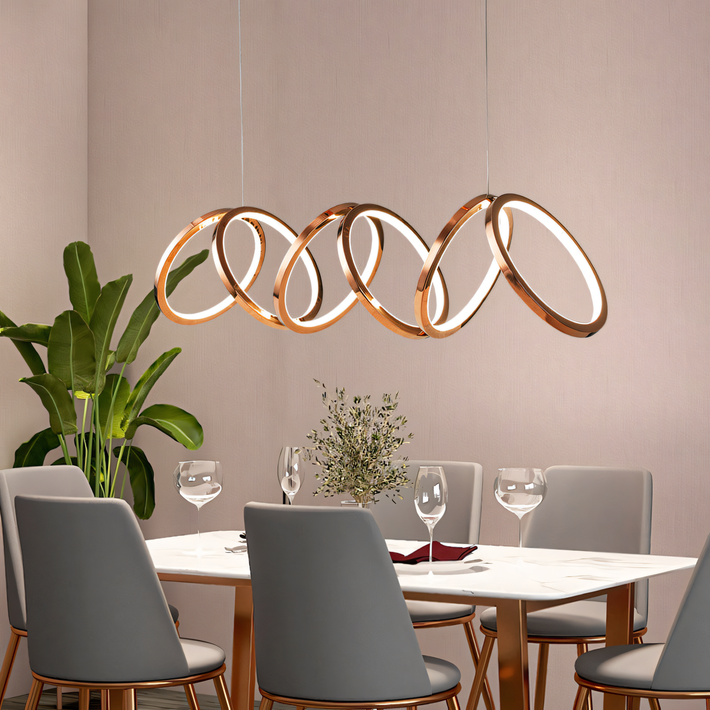 Upgrade your home décor with a touch of modern luxury. This 6-Ring Rose Gold LED Chandelier boasts a warm glow and cascading design for a captivating light display.