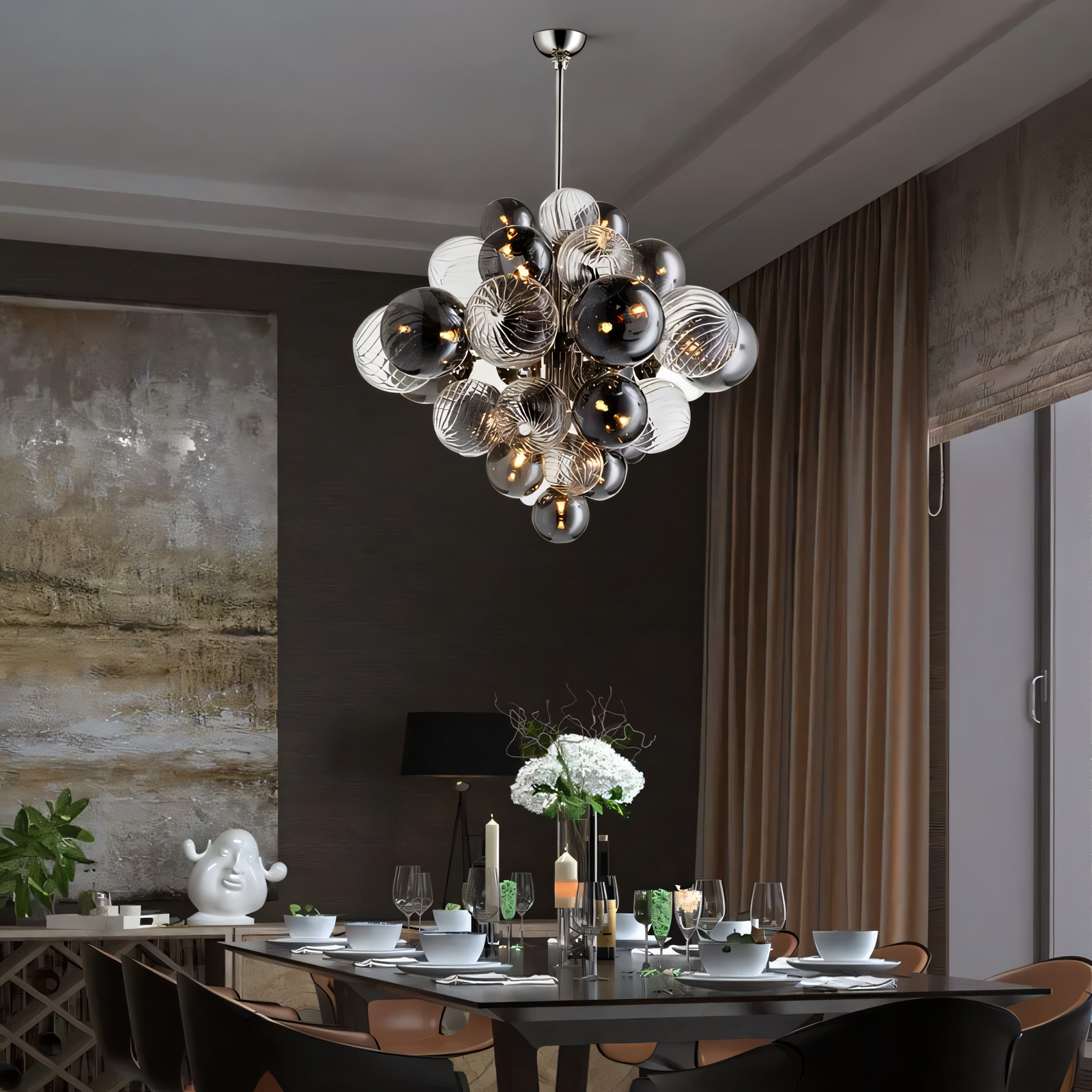 This eye-catching chandelier combines a sleek silver frame with smokey and clear glass globes for a captivating modern look.