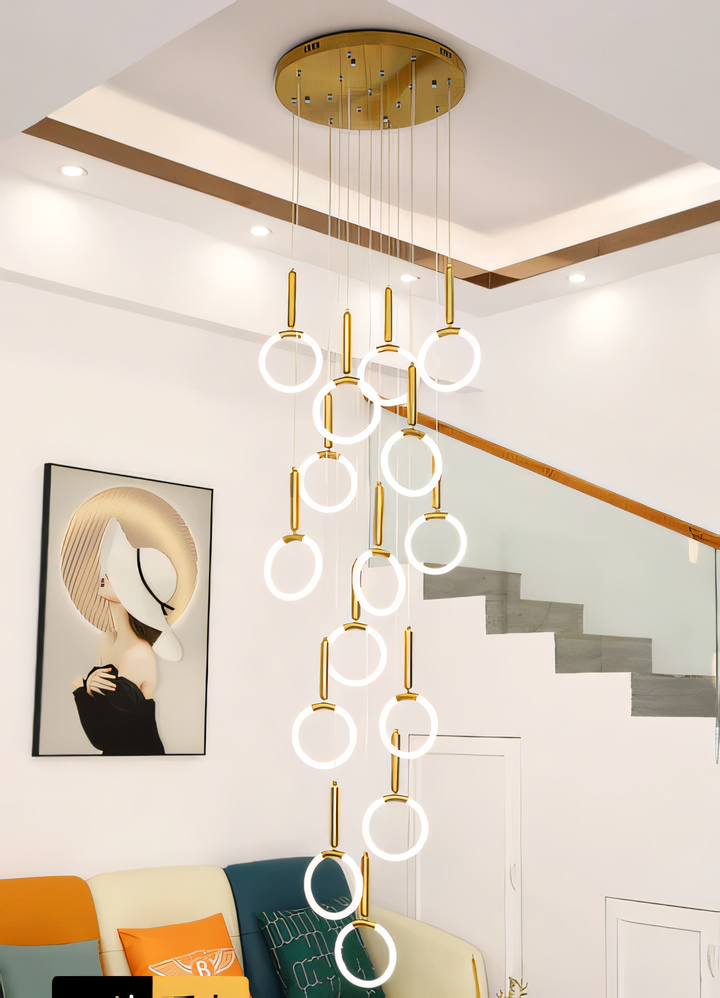 Visually striking gold ring double-height pendant lamp