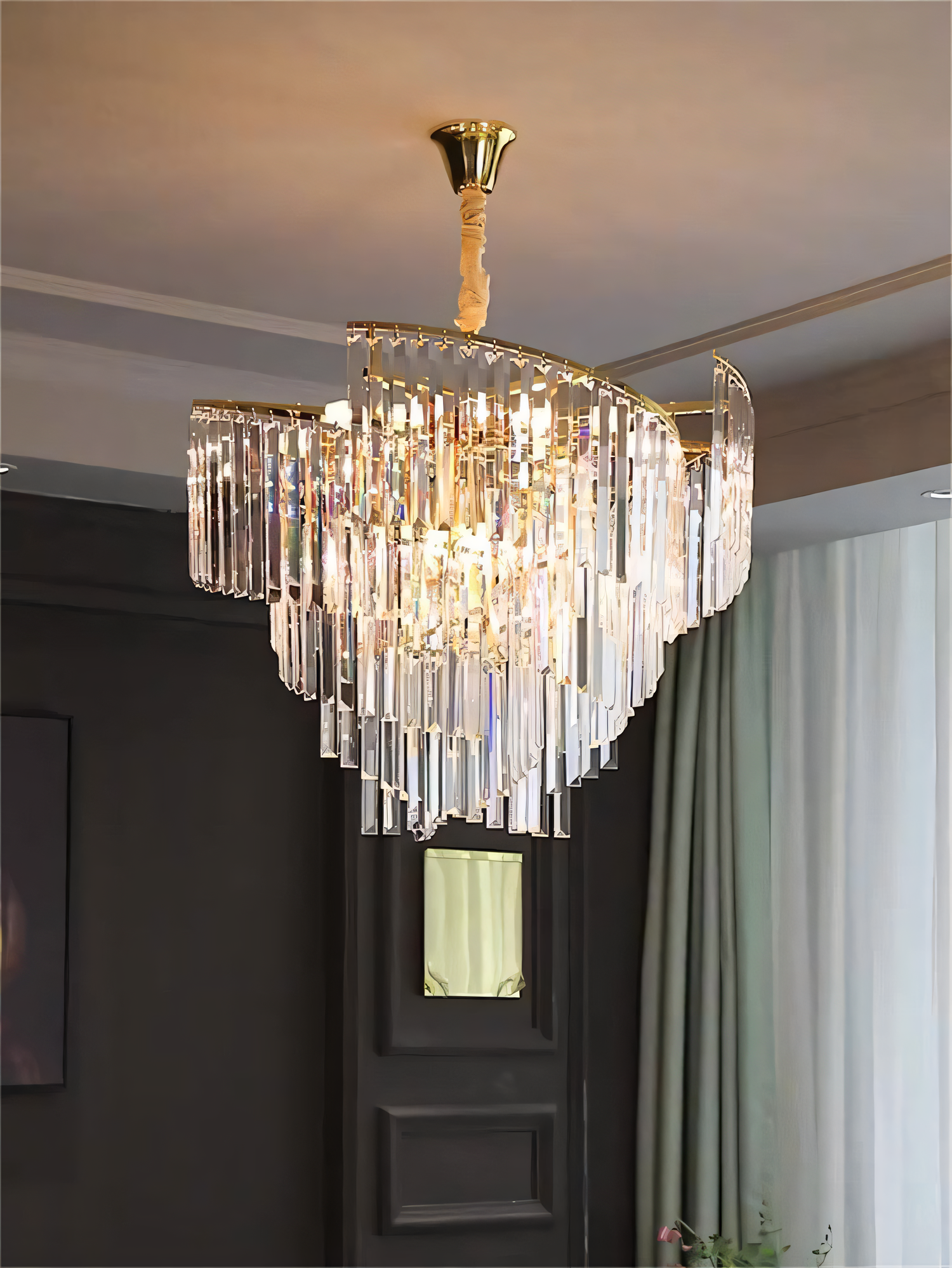 Transform your space with the luxurious 600mm Gold Crystal Chandelier. Energy-efficient LED bulbs illuminate sparkling crystals for a captivating light display.