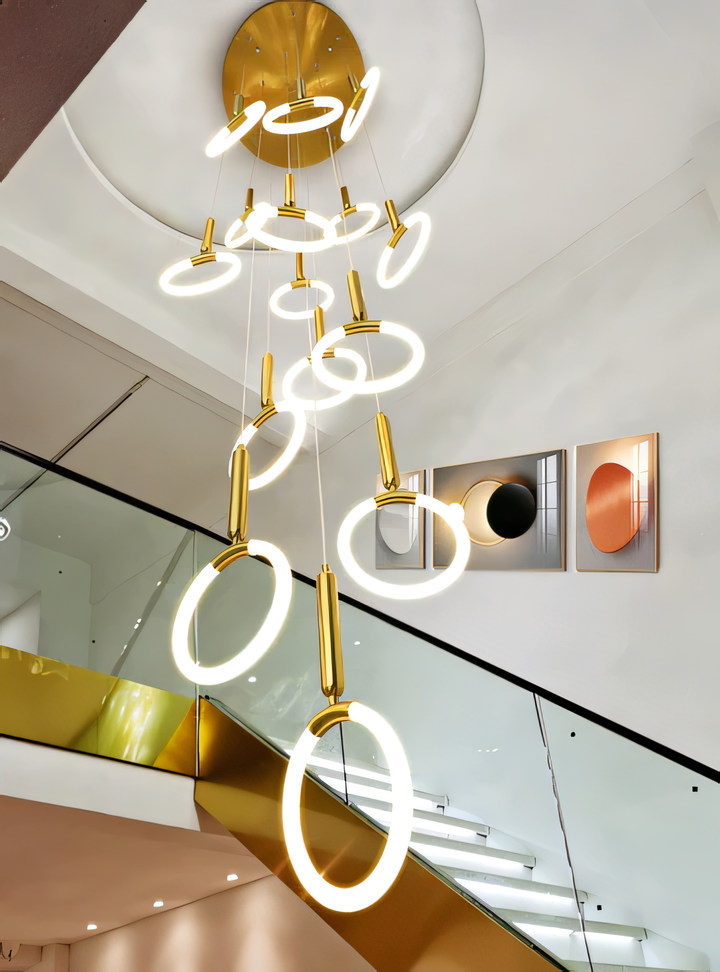 Warm and inviting gold ring double-height chandelier