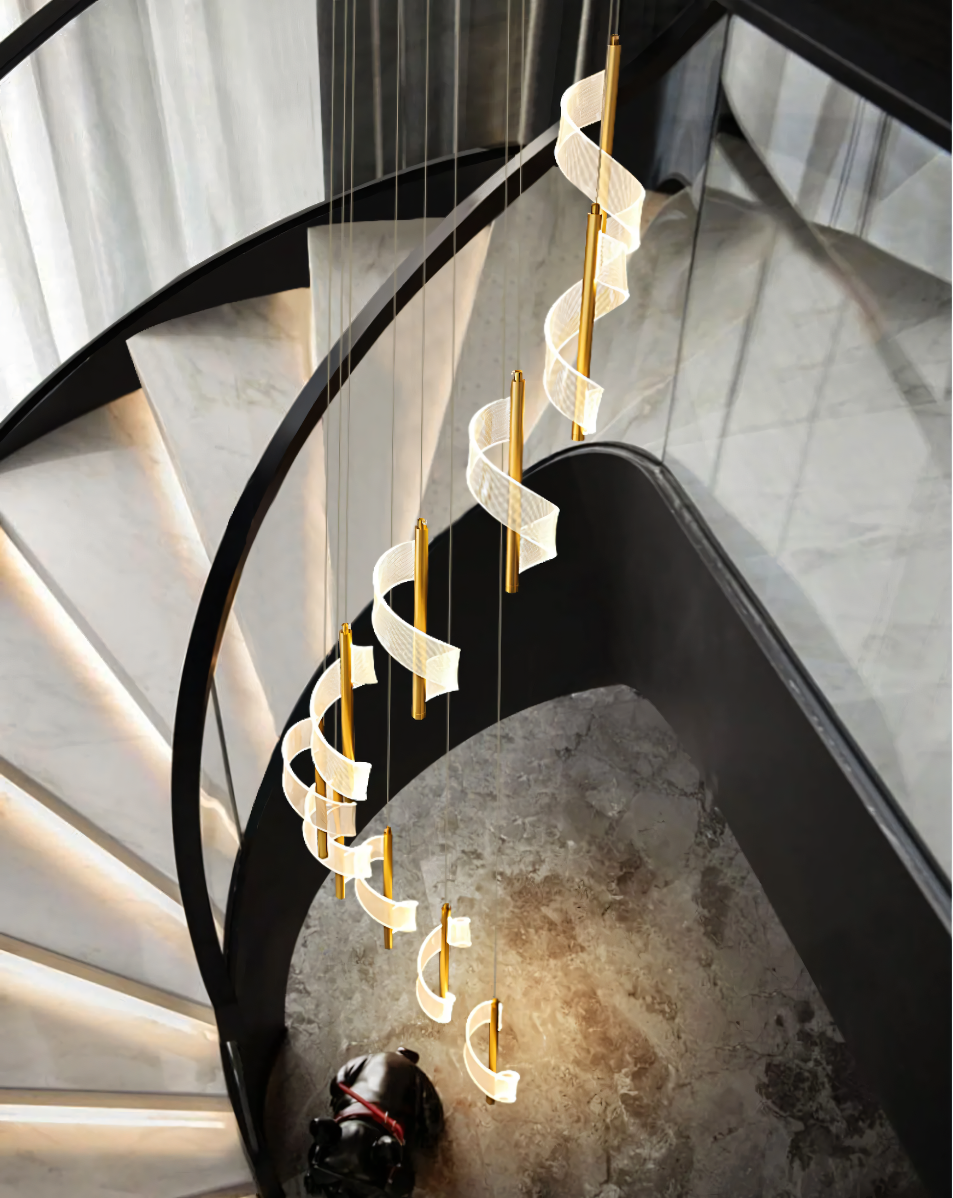 Grand staircase lighting with curled metal arm chandeliers