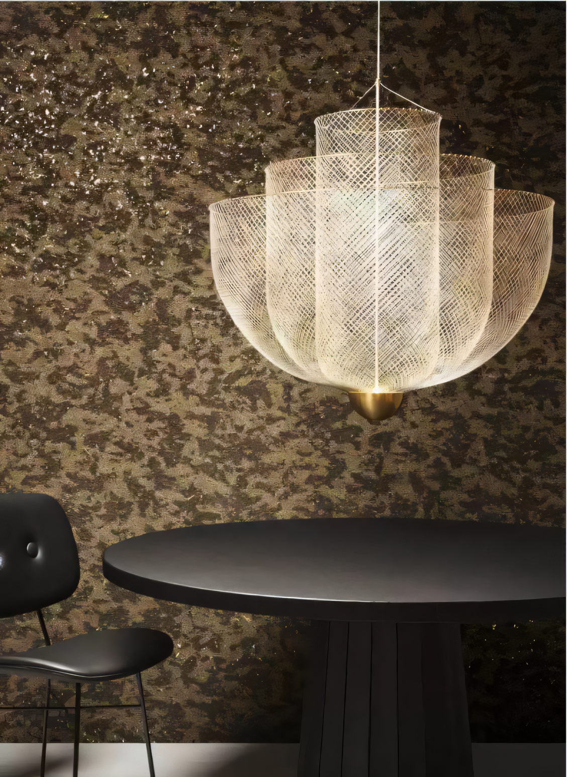 Warm ambient lighting from metal mesh ceiling chandelier