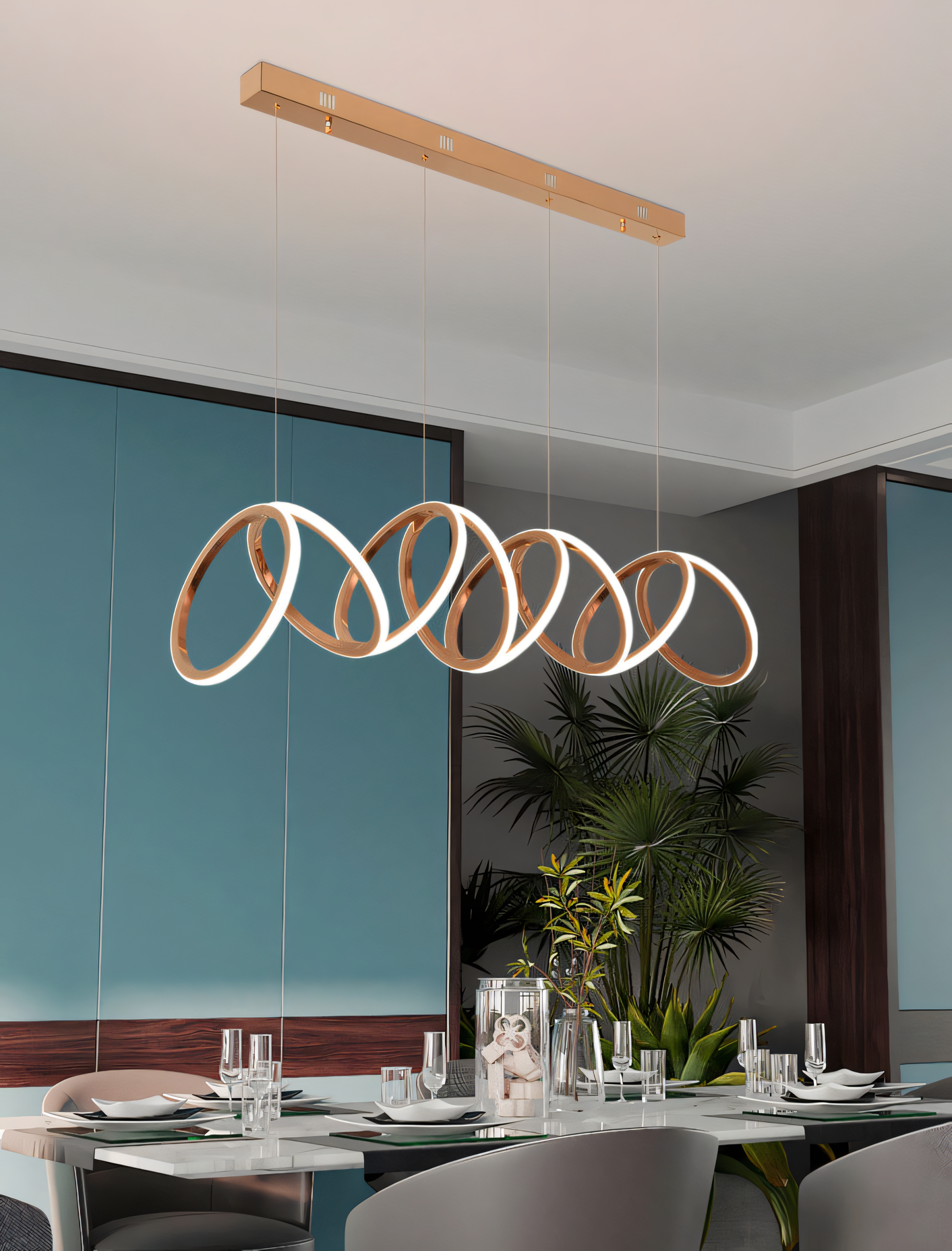 Transform your space with the luxurious 6-Ring Rose Gold Metal LED Chandelier. Warm LED bulbs illuminate the cascading rose gold rings for a modern and inviting ambiance.