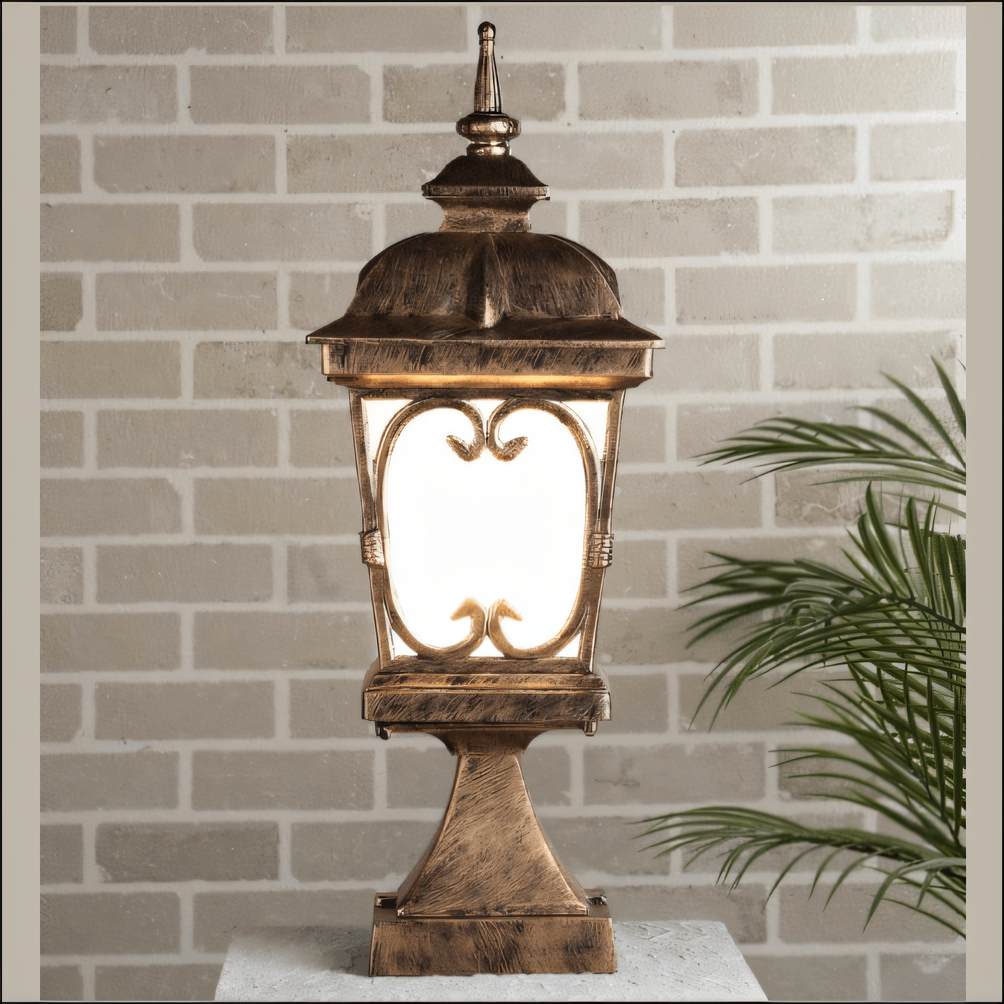 Antique Gold Metal Gate Light illuminating the entryway to a Luxury House