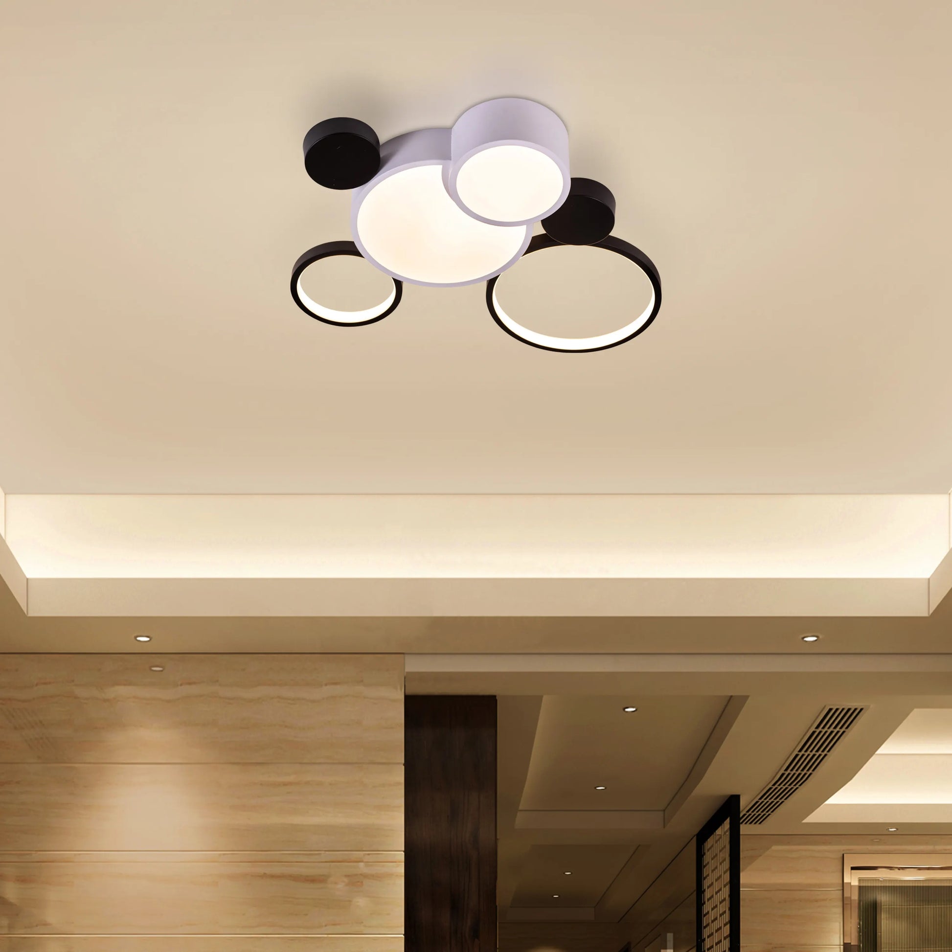 Medium-sized Heat Wave LED ceiling light brightening a cozy bedroom